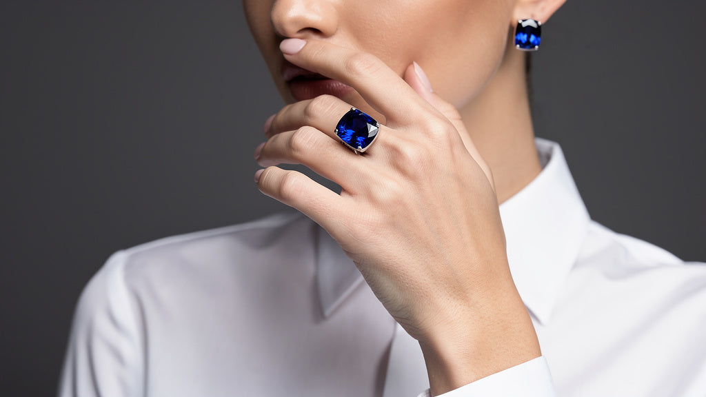Blue sapphire ring and stud earrings, the September birthstone in gold