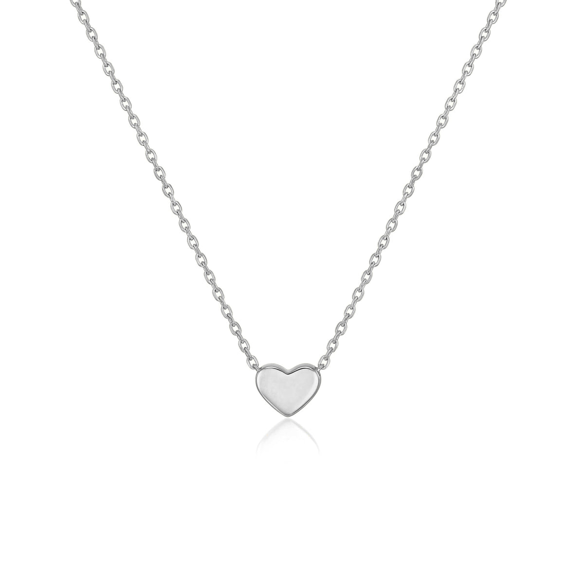 14K white gold heart necklace, tiny polished heart fixed on a fine cable chain, close-up on white