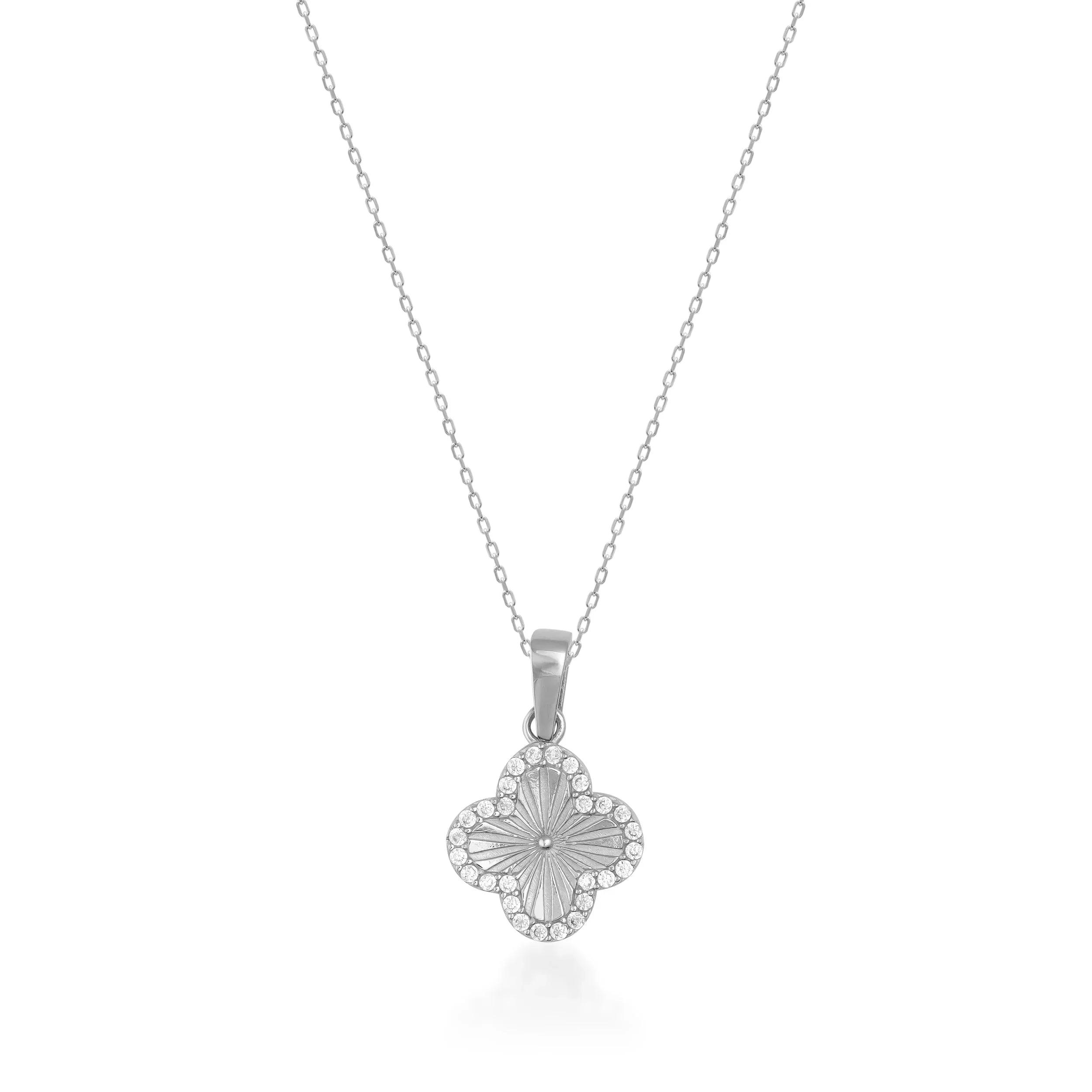 White gold clover pendant necklace with diamond accents on a fine chain, elegant jewelry