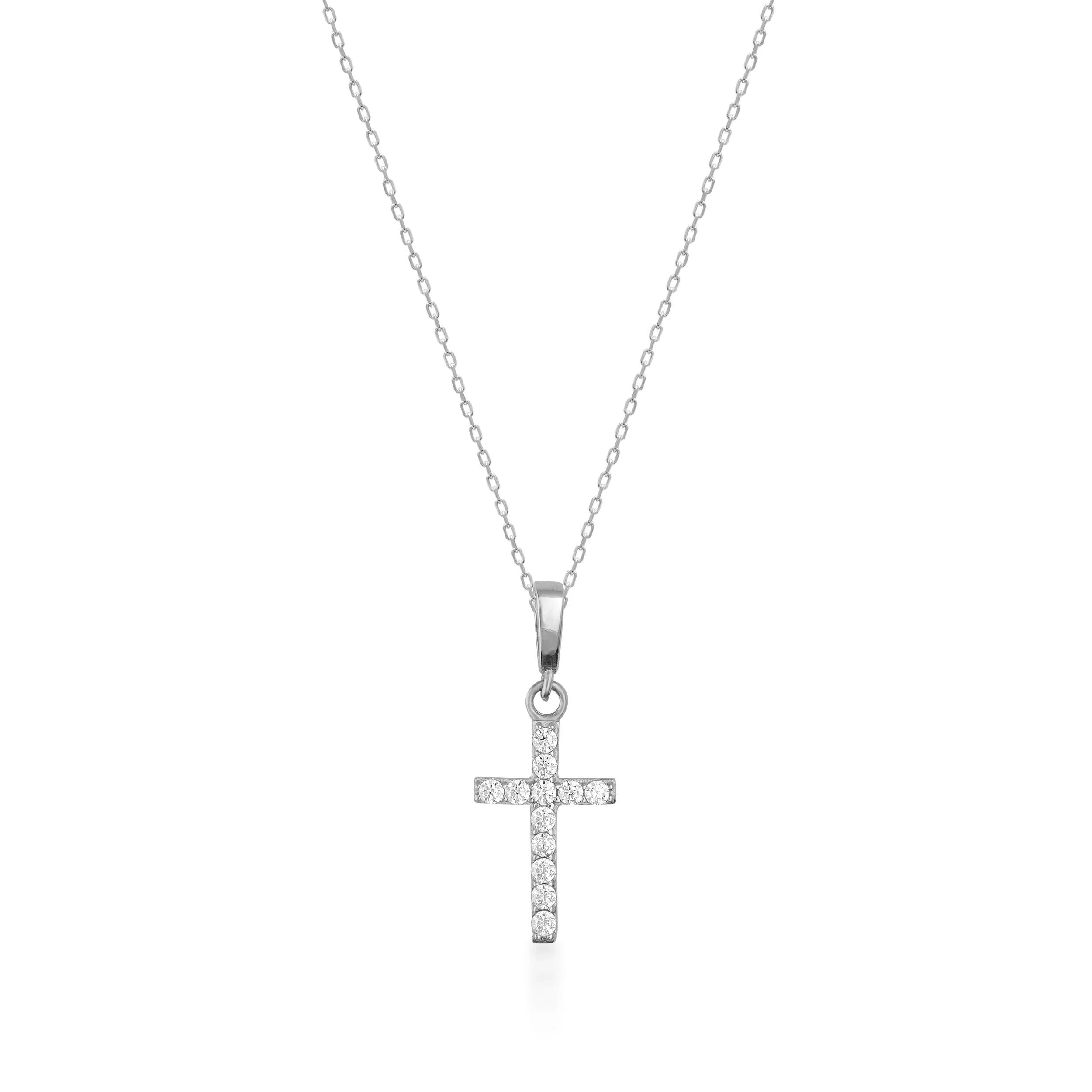 White gold cross pendant necklace with round diamonds on a delicate chain, isolated on white background