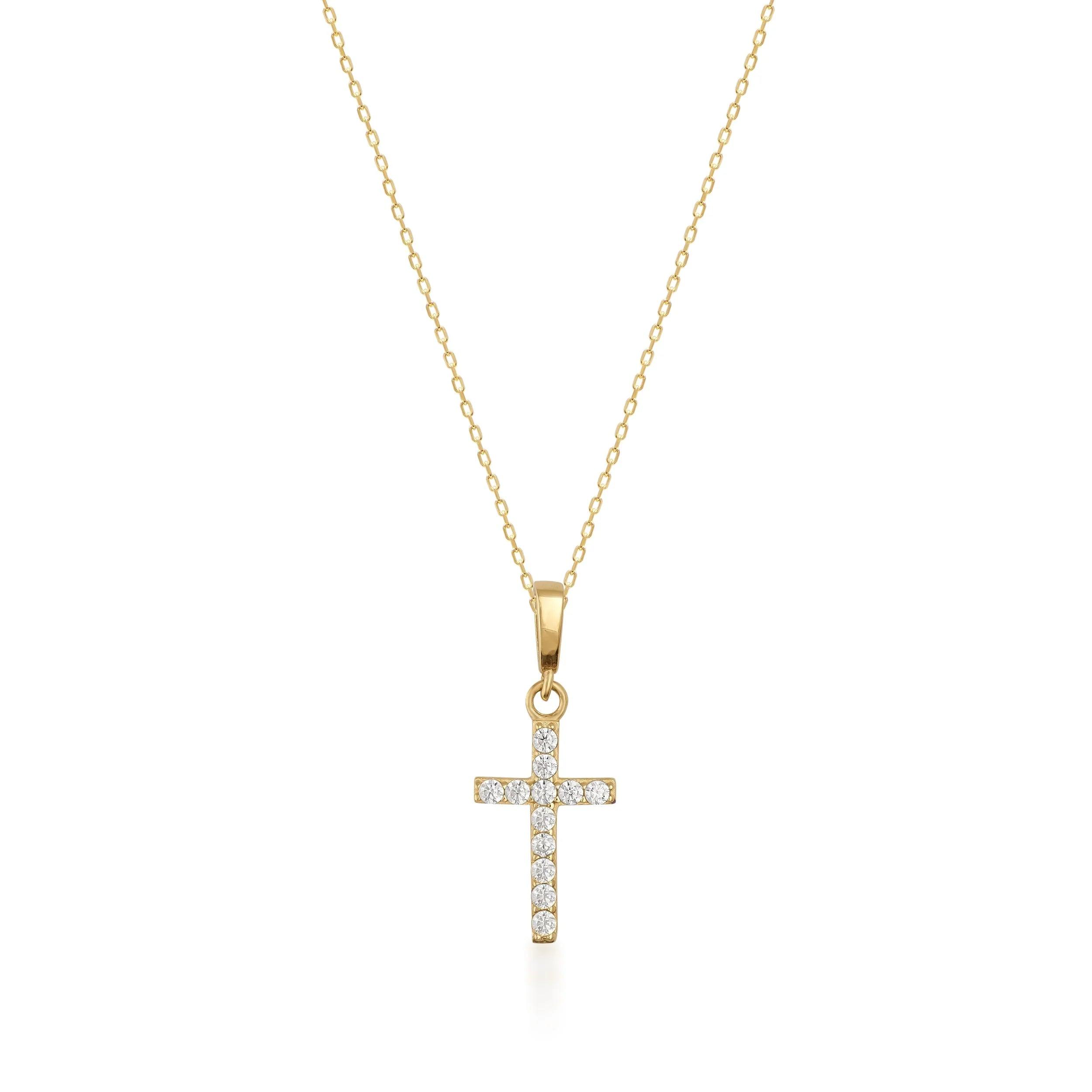 Gold chain necklace with a diamond cross pendant on white background