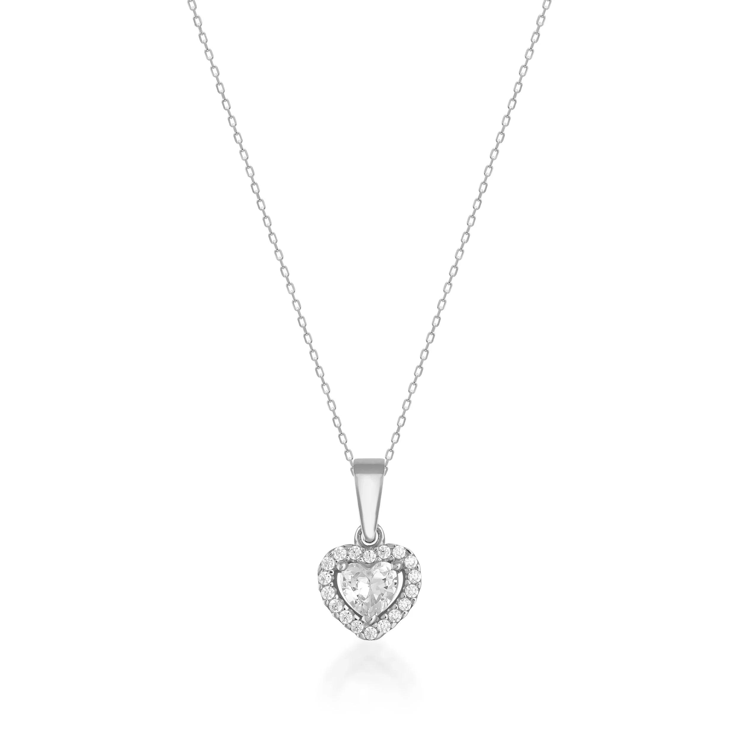 Heart-shaped diamond pendant necklace with halo setting on a delicate gold chain