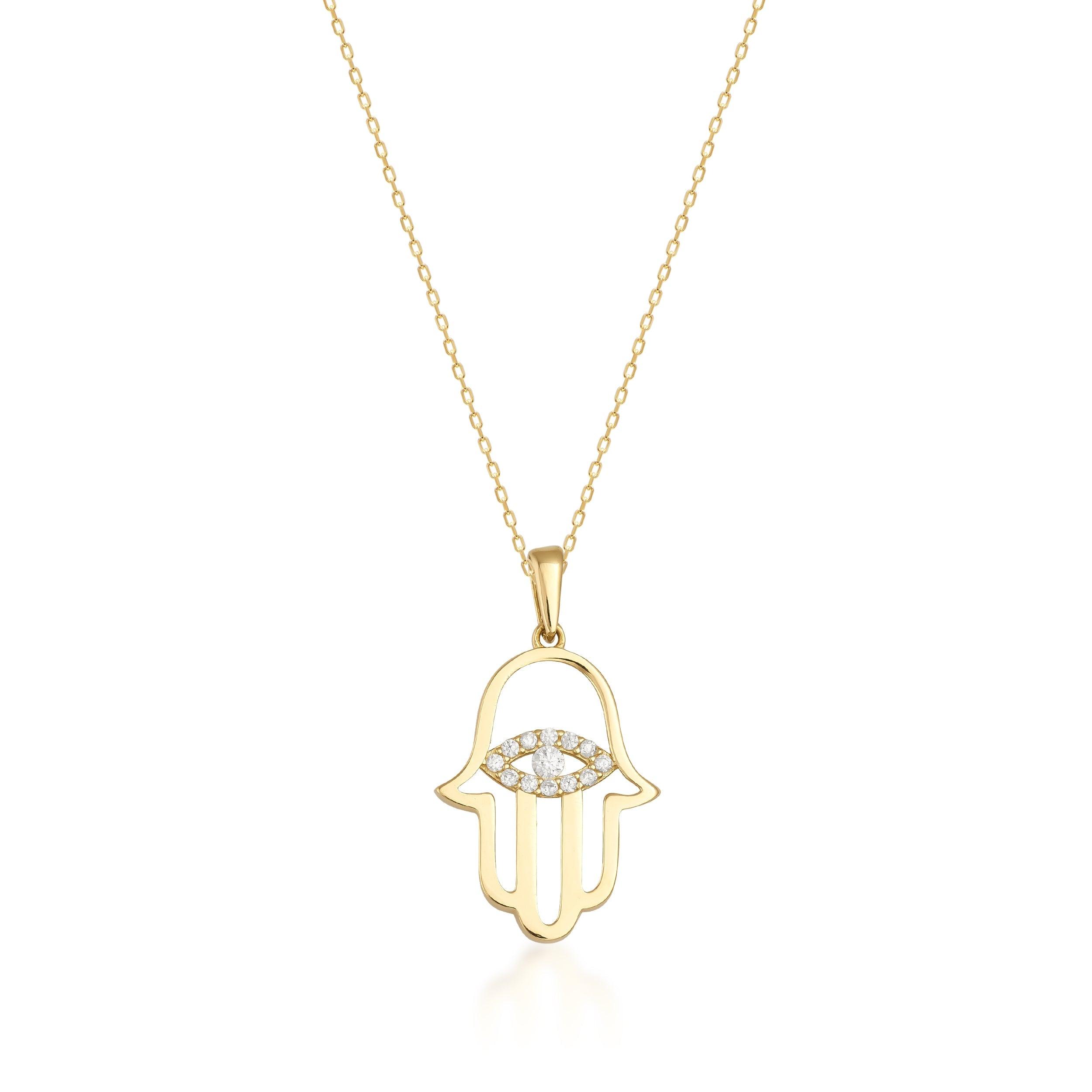 Gold Hamsa pendant necklace with diamond eye detail on fine gold chain, white background