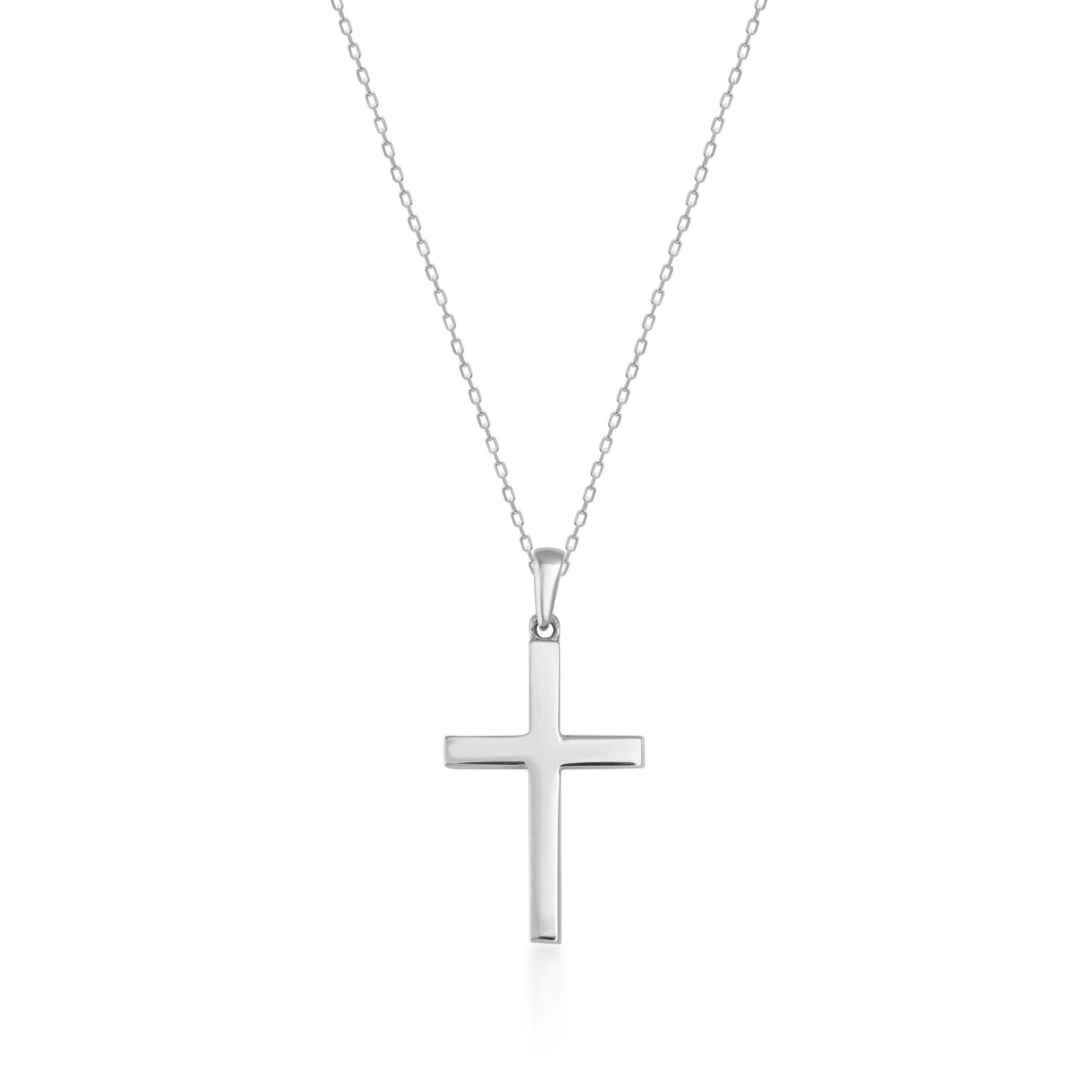 Simple gold cross pendant necklace on a delicate chain, minimalist jewelry design