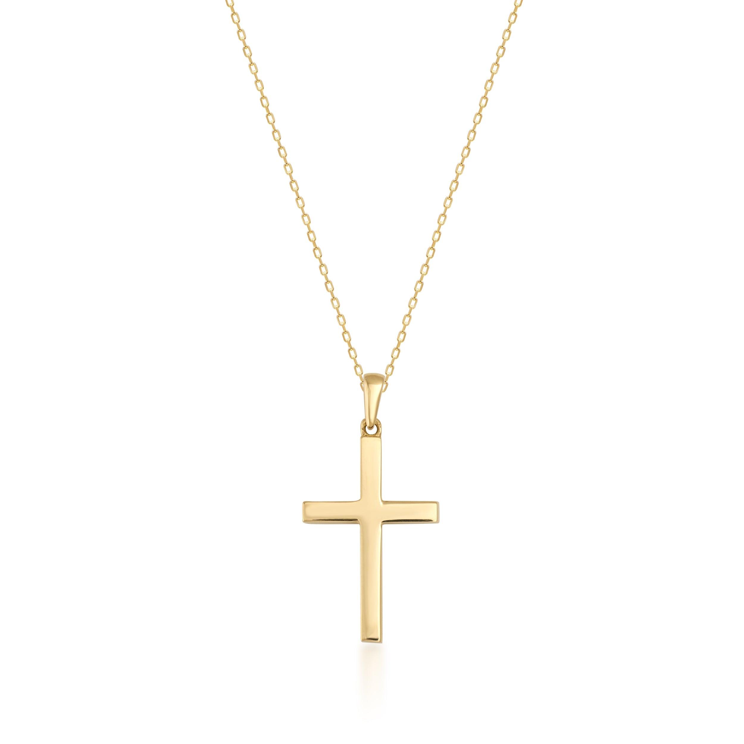 Gold cross pendant necklace with delicate chain on white background