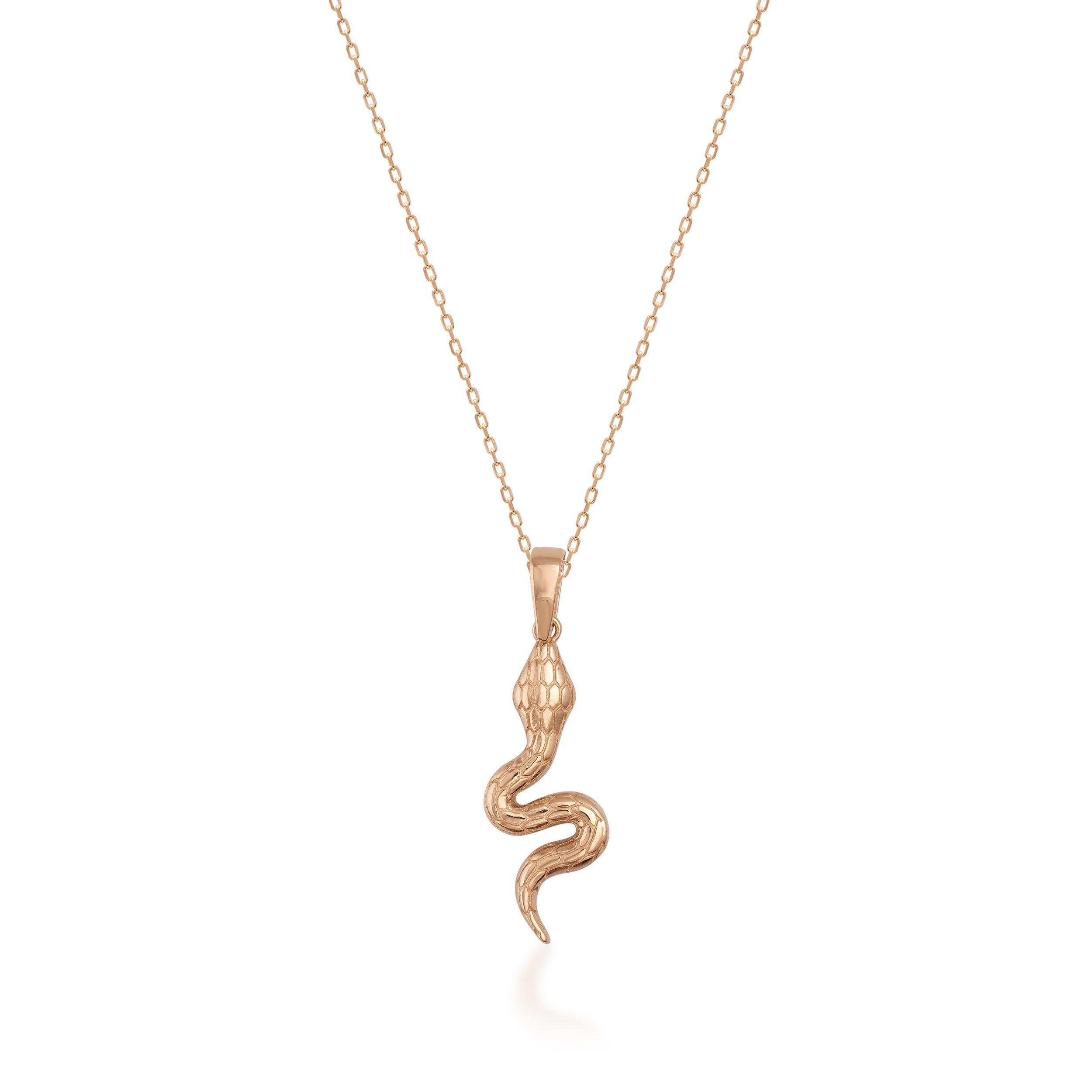 Gold snake pendant necklace with textured detailing on a delicate chain