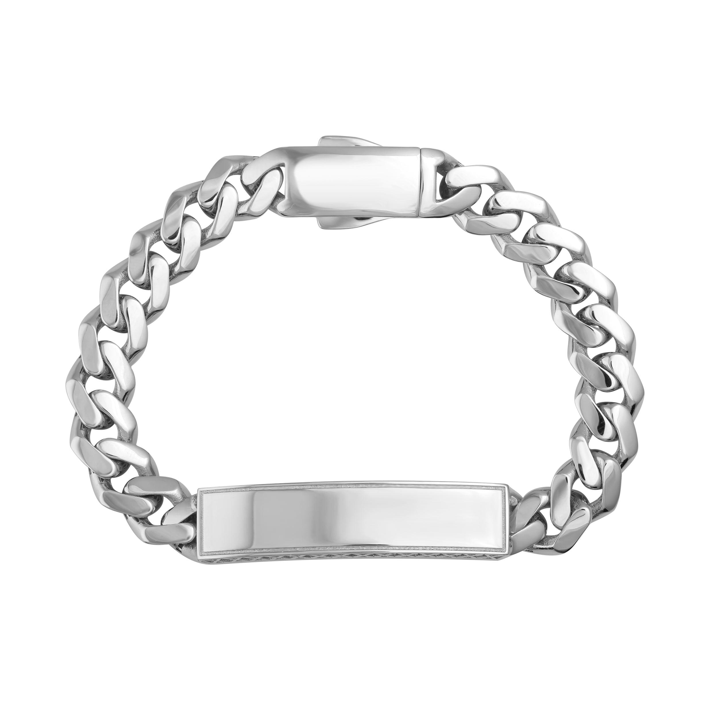 Men's silver Cuban link chain ID bracelet with polished plate on white background