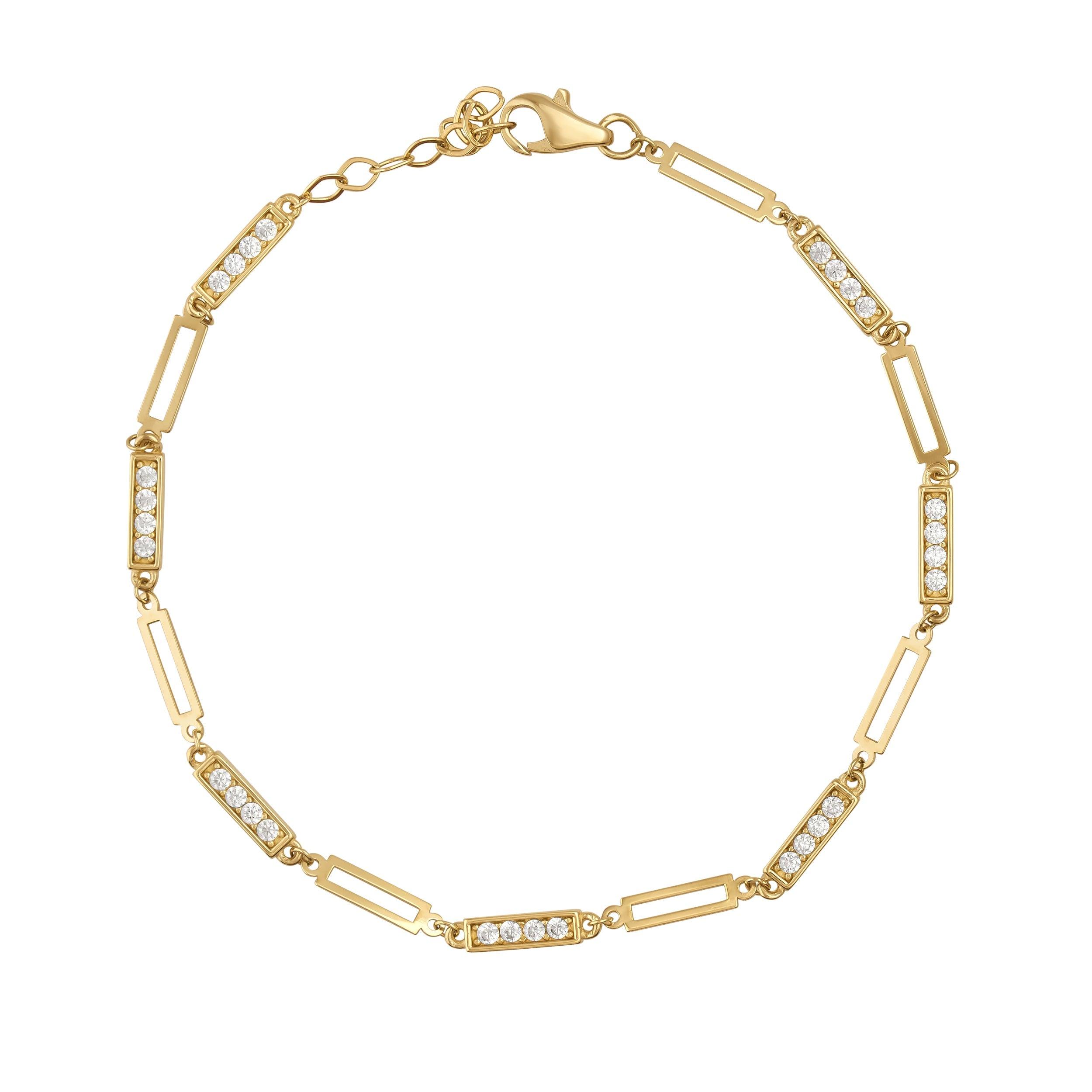Gold bracelet with rectangular links and sparkling gemstones on a white background