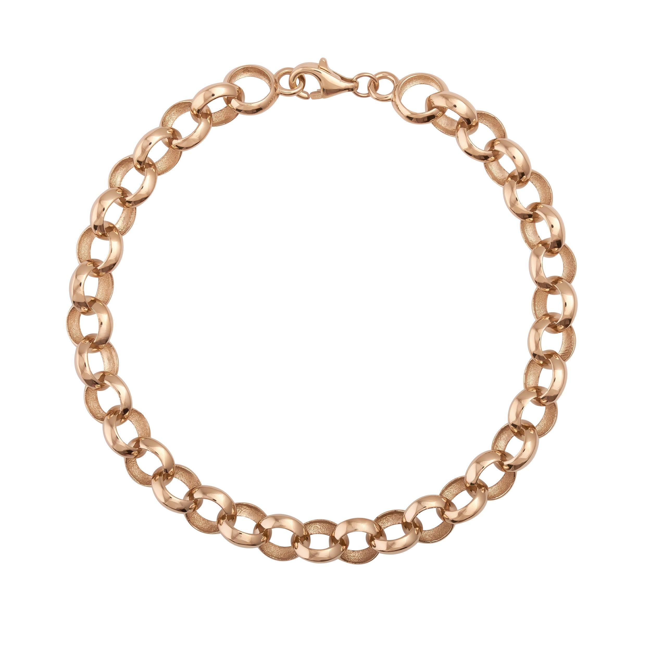 Chunky gold chain bracelet with round links and lobster clasp on white background