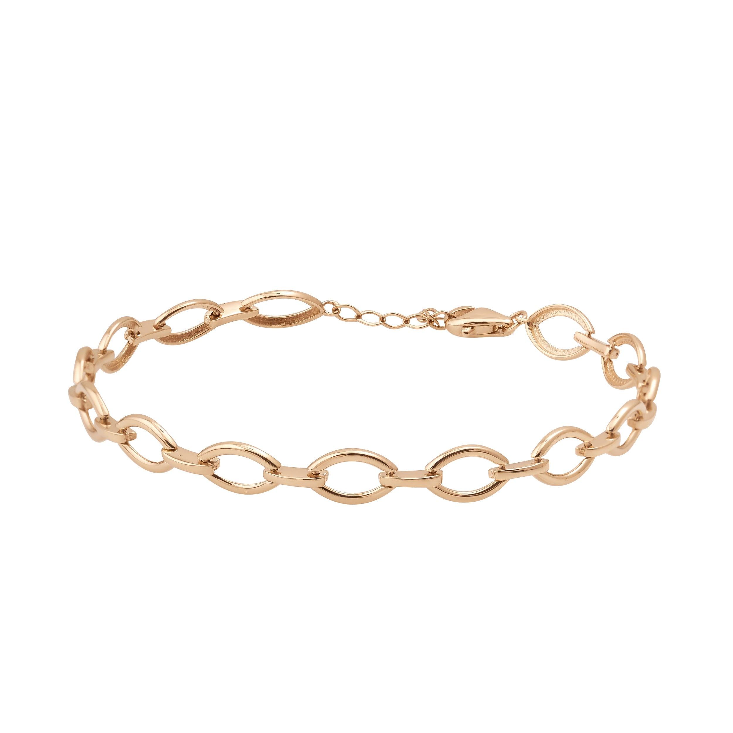 Gold chain link bracelet with oval links and lobster clasp on white background
