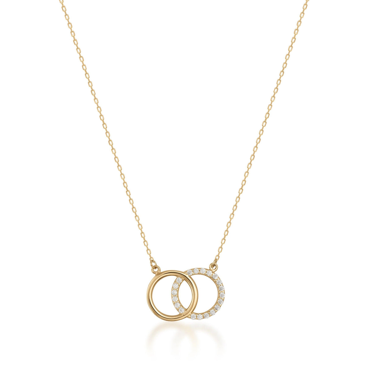 14K gold necklace with two interlocking circle pendants, one accented with small cubic zirconia.