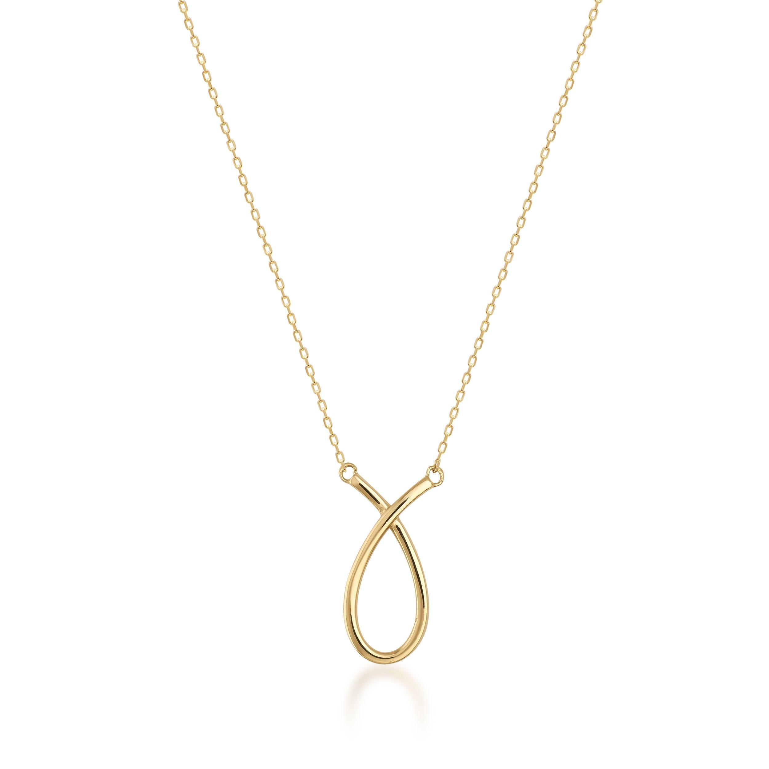 Minimalist gold necklace with an open loop pendant on a fine gold chain, isolated on white