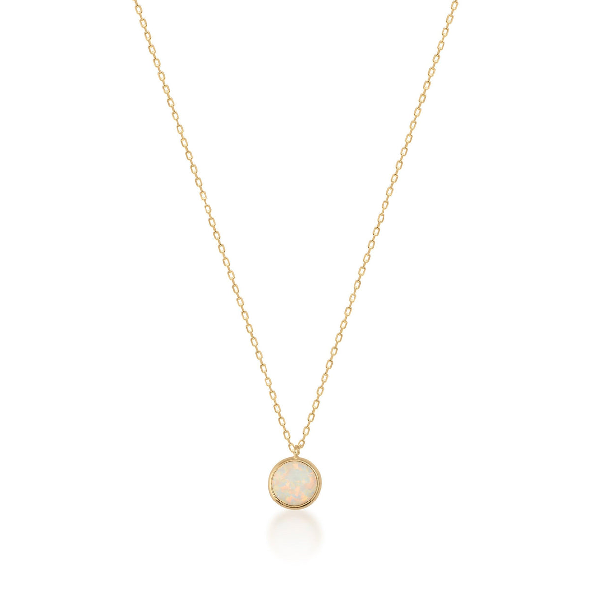 14K gold necklace with round opal-look pendant on a plain white background