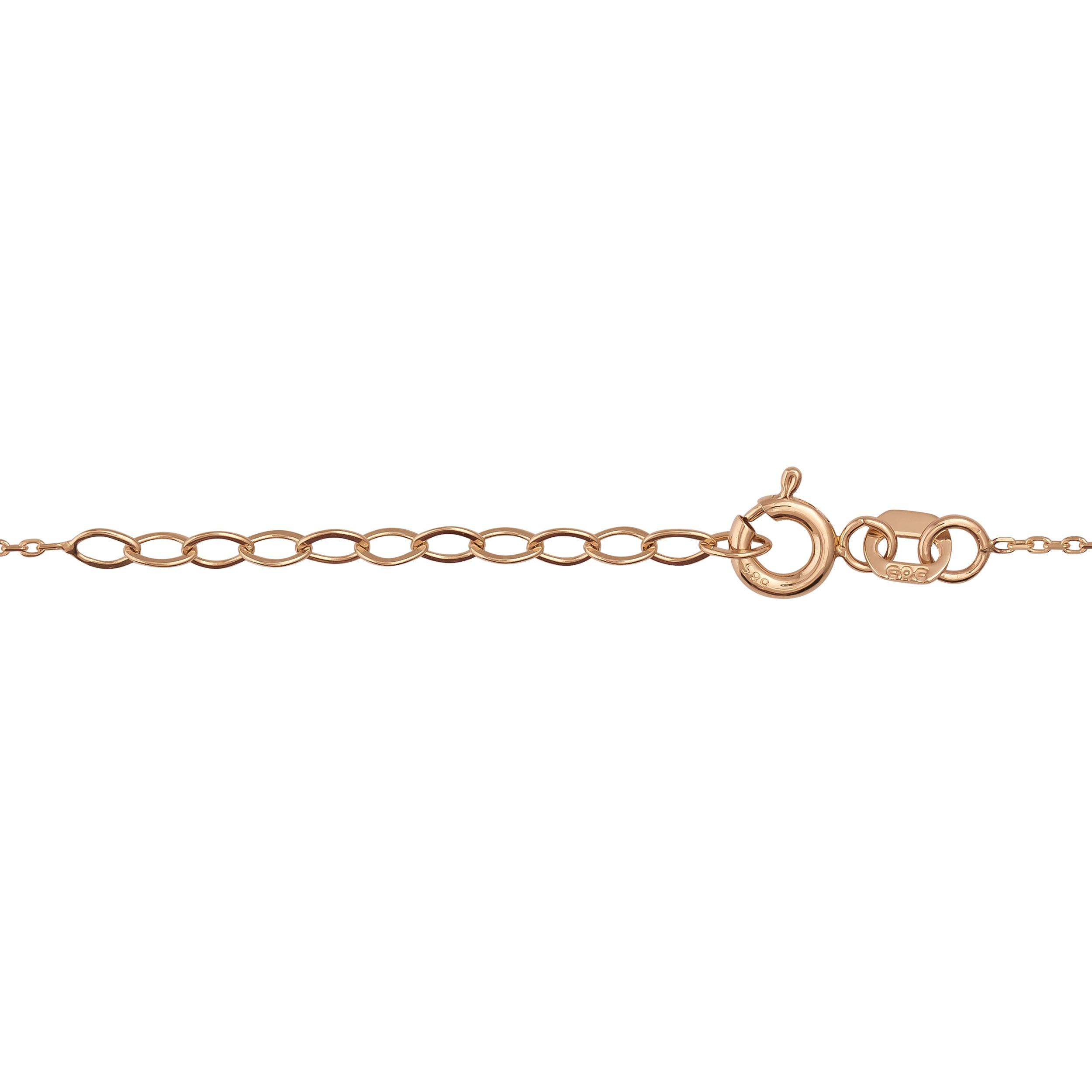 Close-up of gold chain necklace with oval links and spring ring clasp on white background