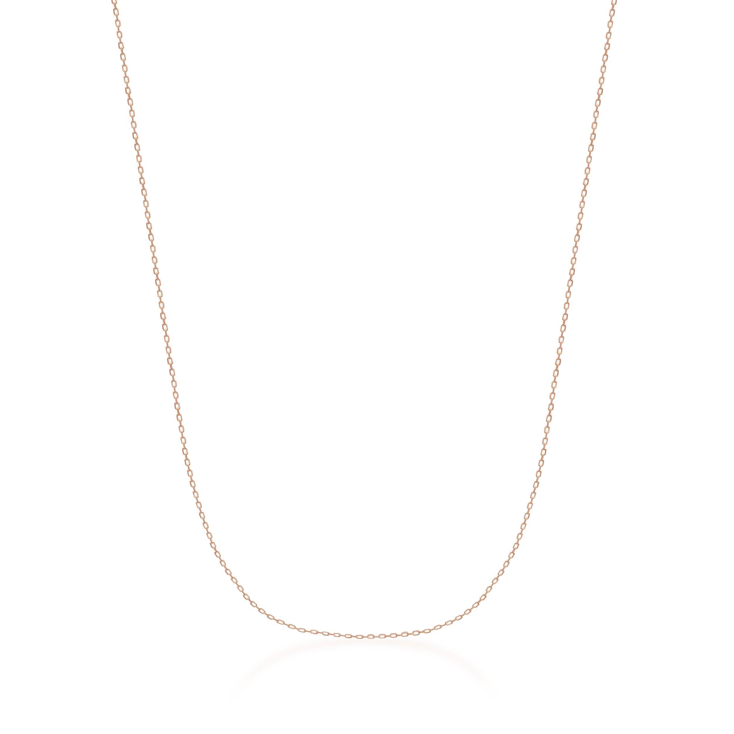 Delicate gold chain necklace on white background, minimalist fine jewelry