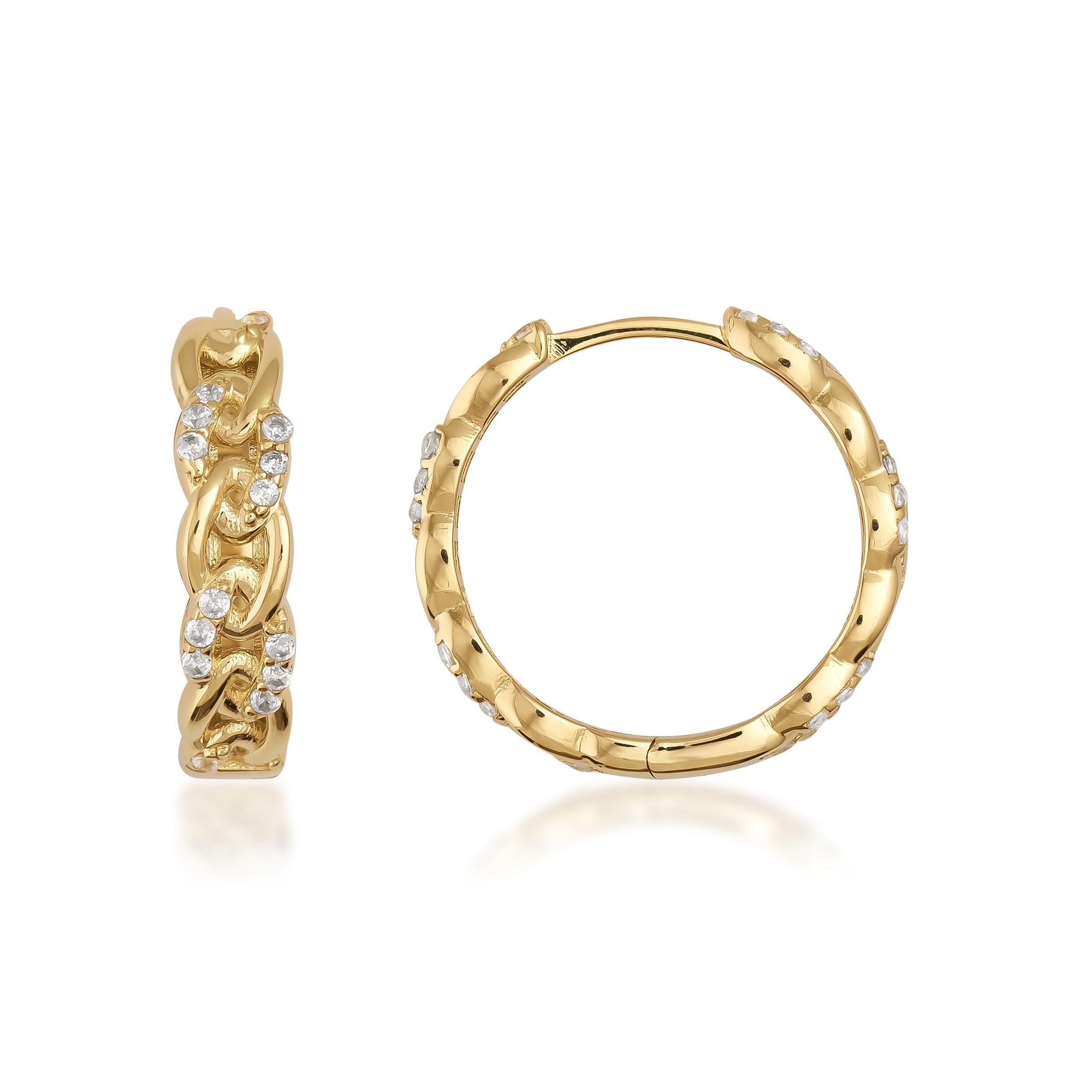 Gold hoop earrings with chain design and small round clear stones on white background