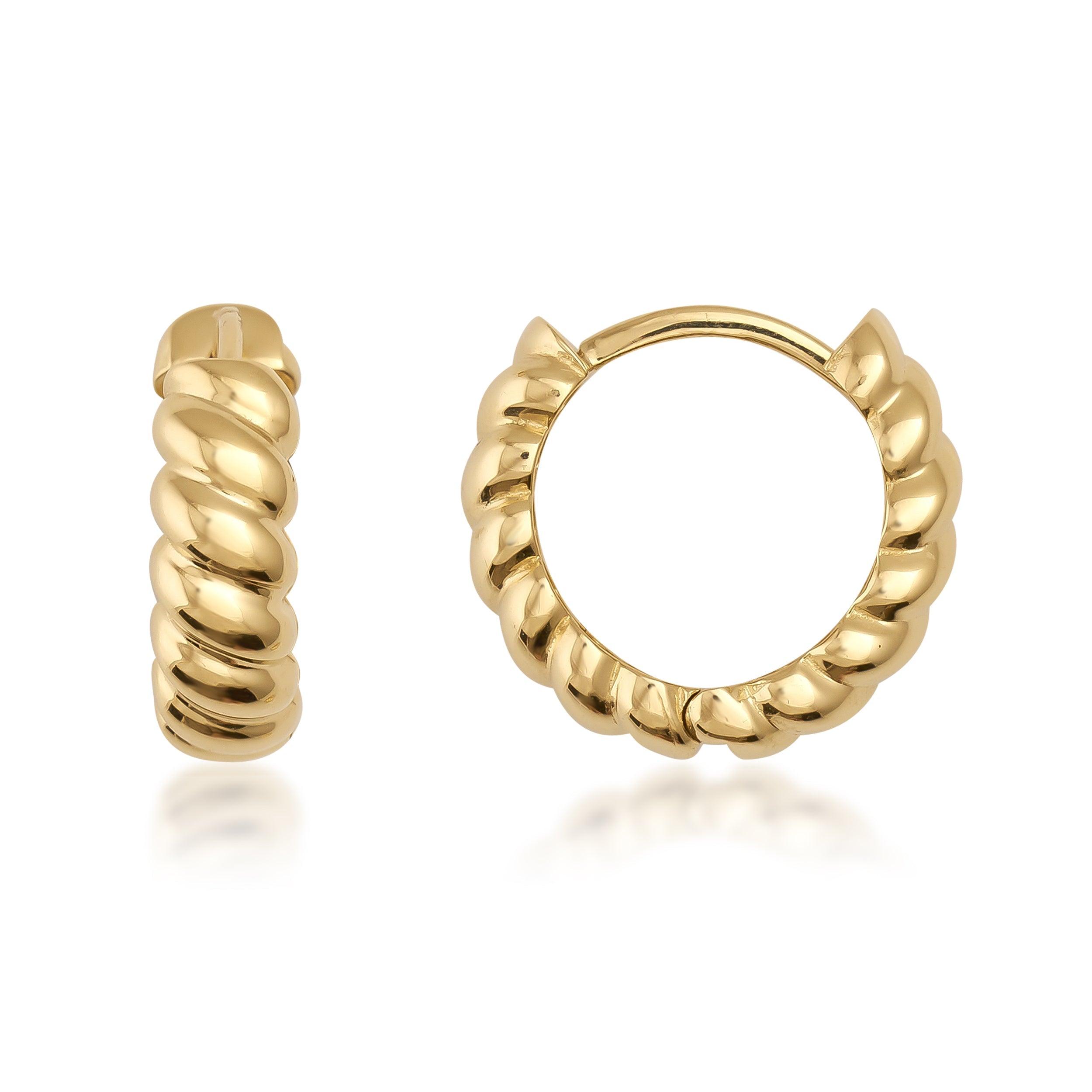 Chunky twisted gold hoop earrings with a polished, ridged design on a white background.