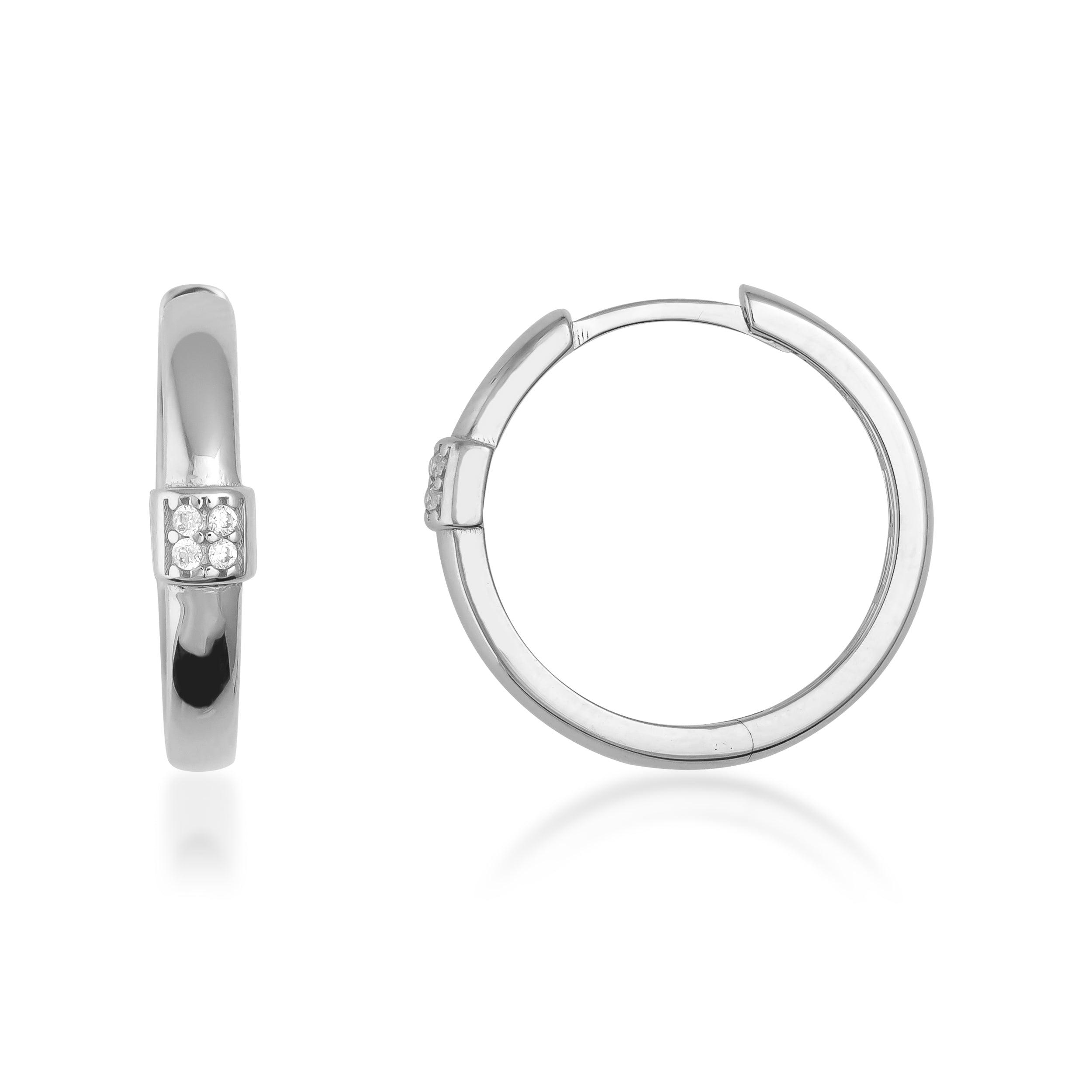 White gold hoop earrings with small round diamonds, minimalist jewelry design