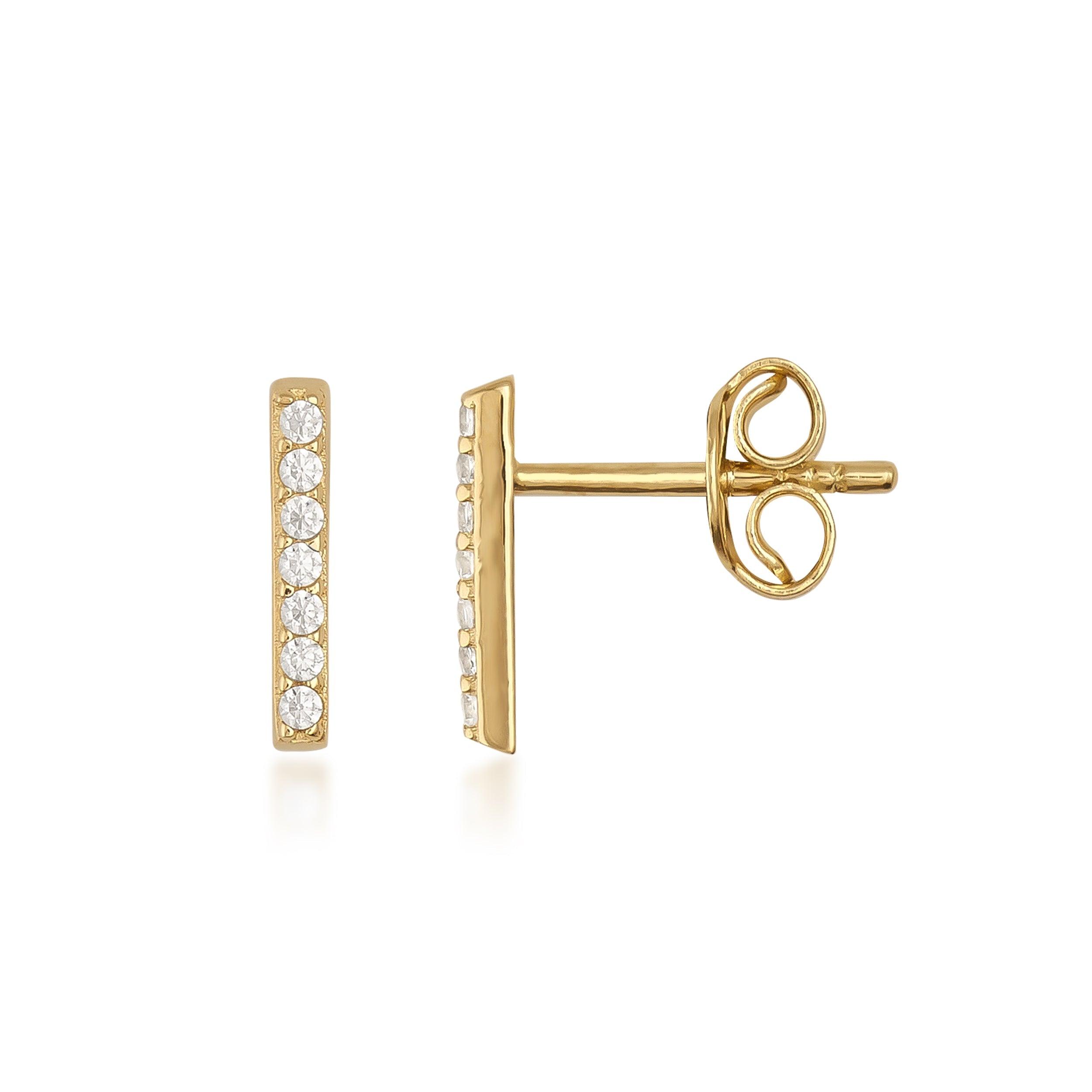 Gold bar stud earrings with row of clear round gemstones, minimalist jewelry design