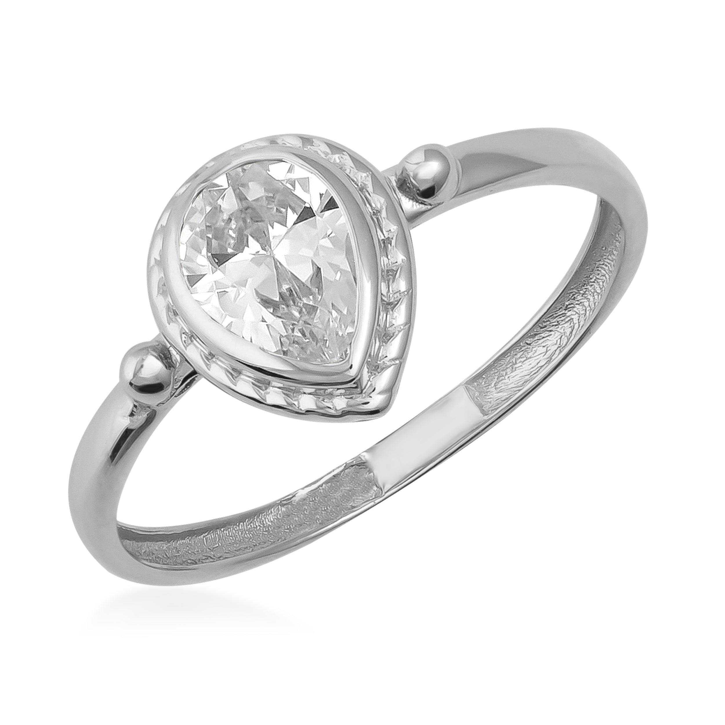 Pear-shaped clear gemstone solitaire ring with silver band on white background
