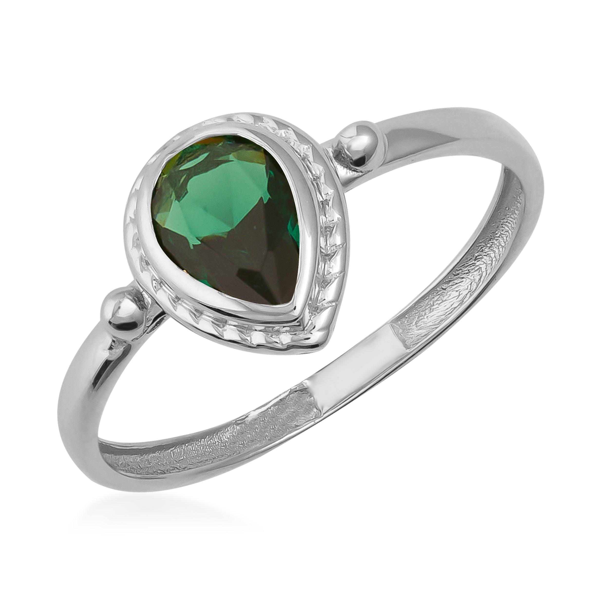 Silver ring with pear-shaped green gemstone and intricate bezel setting