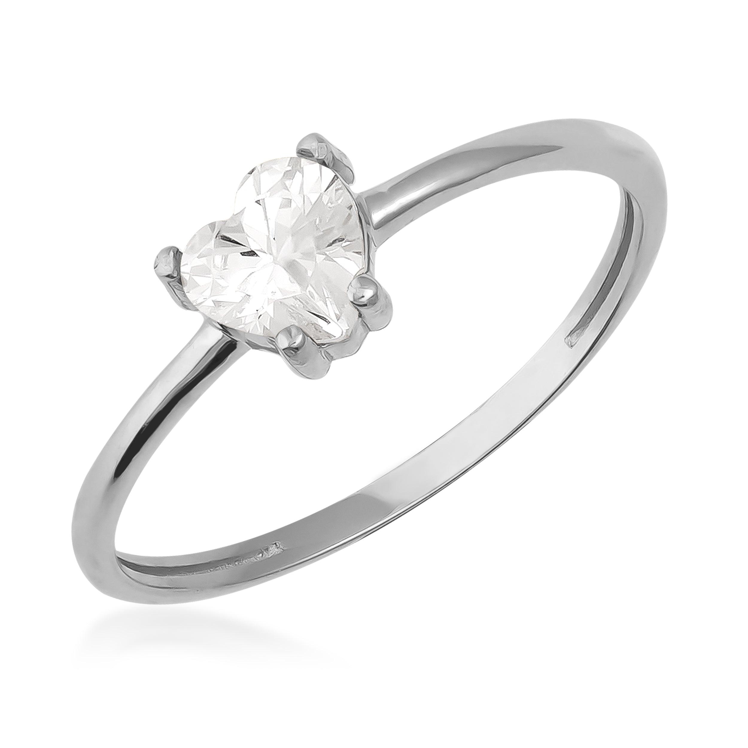 Heart-shaped solitaire diamond ring with white gold band, minimalist jewelry design