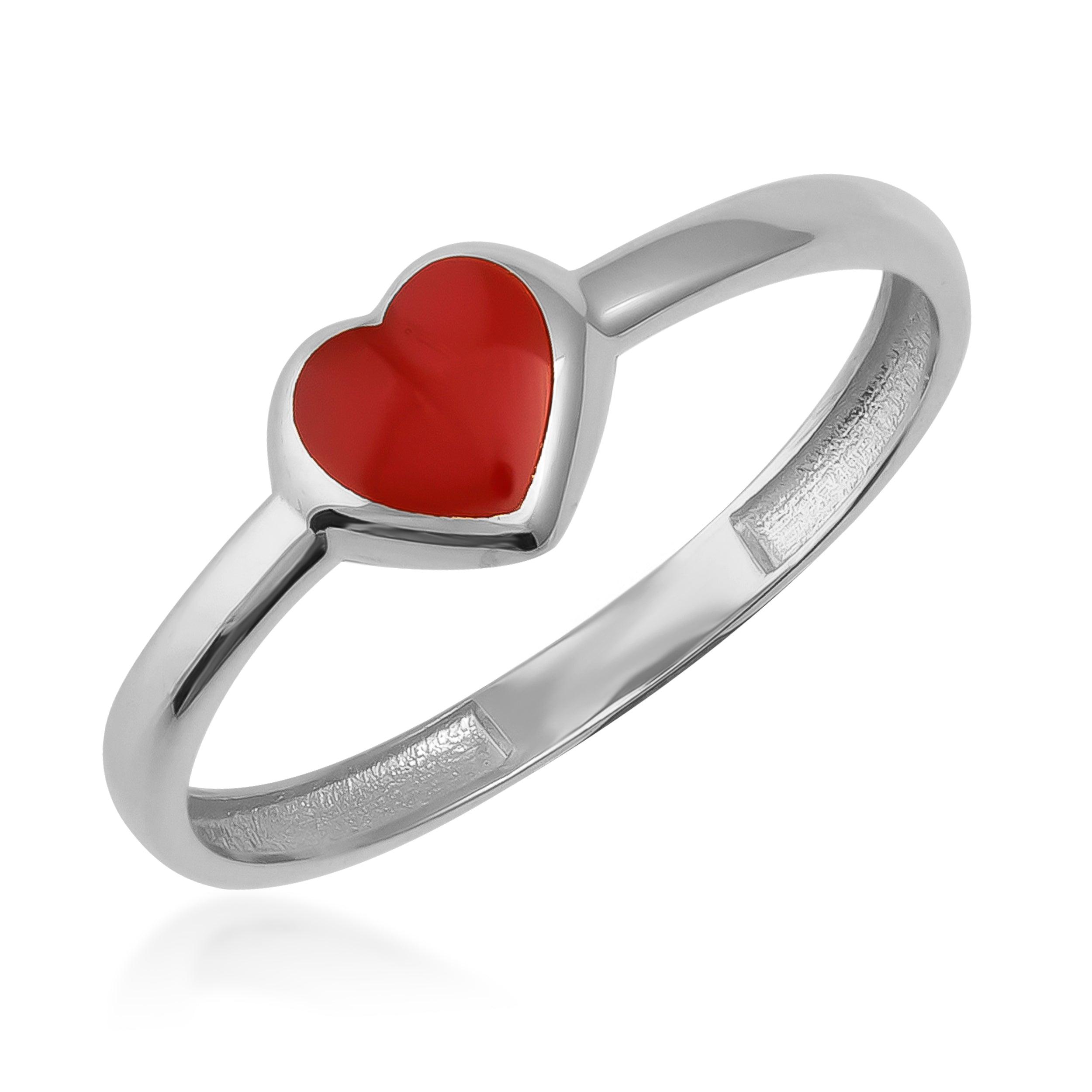 Silver band ring with red heart-shaped gemstone, minimalist jewelry design