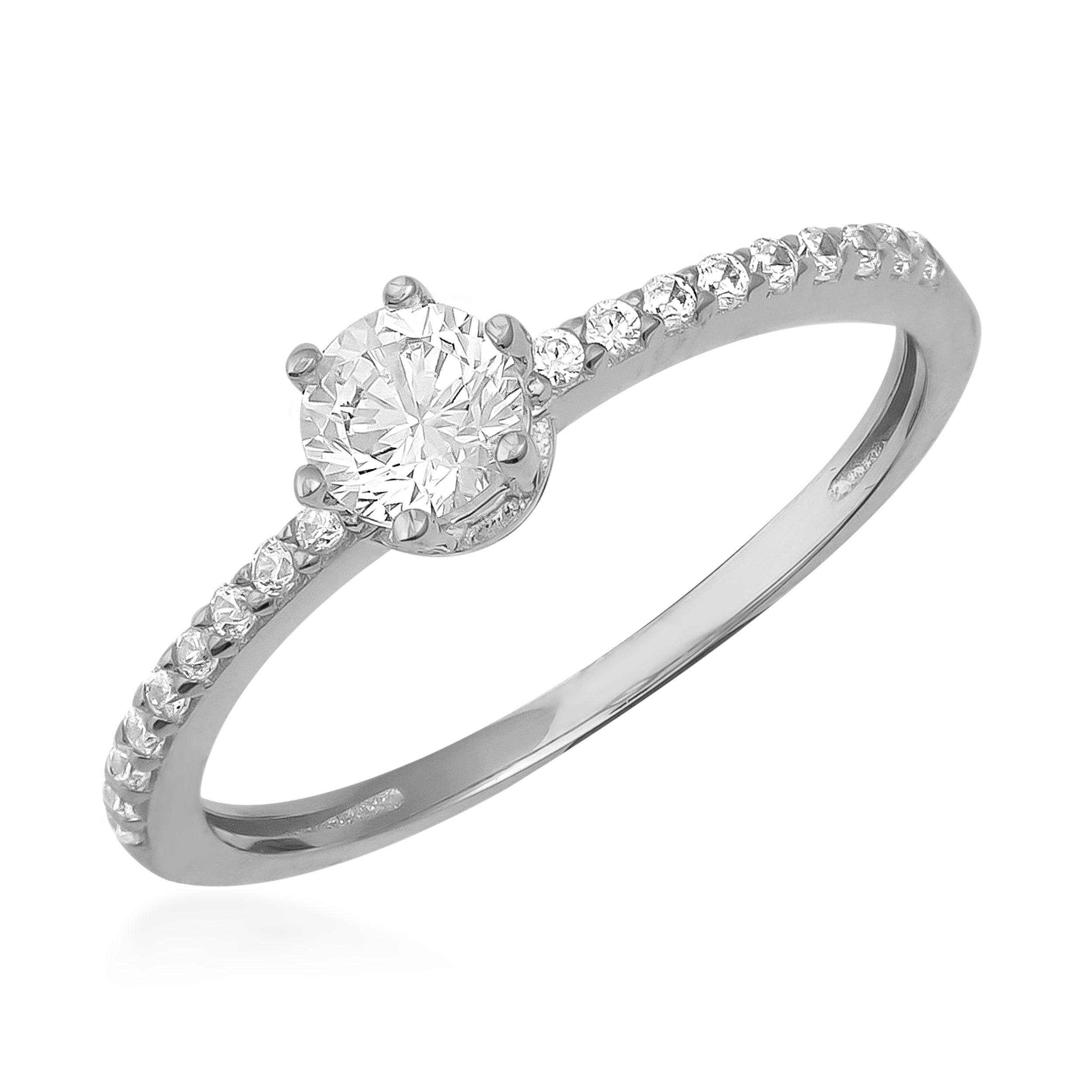 White gold engagement ring with round center diamond and pavé diamond band