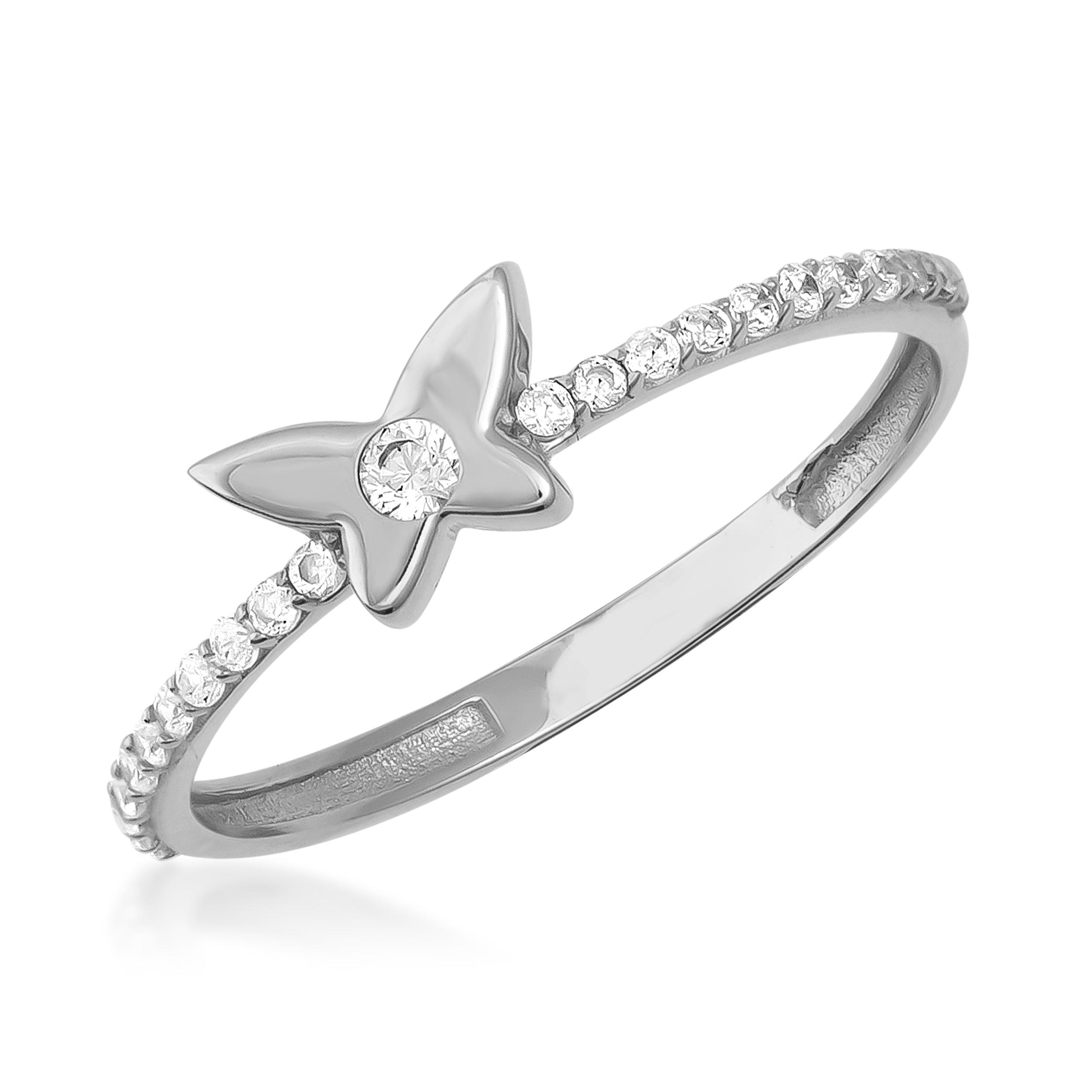 White gold butterfly ring with pavé diamonds and central gemstone, elegant jewelry