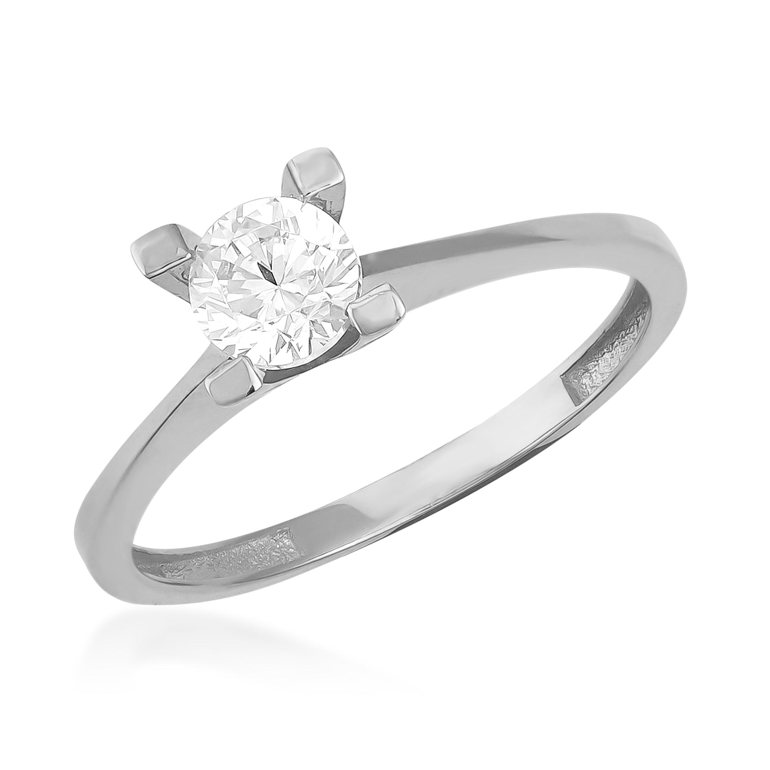 Solitaire white gold ring with round brilliant diamond on plain band