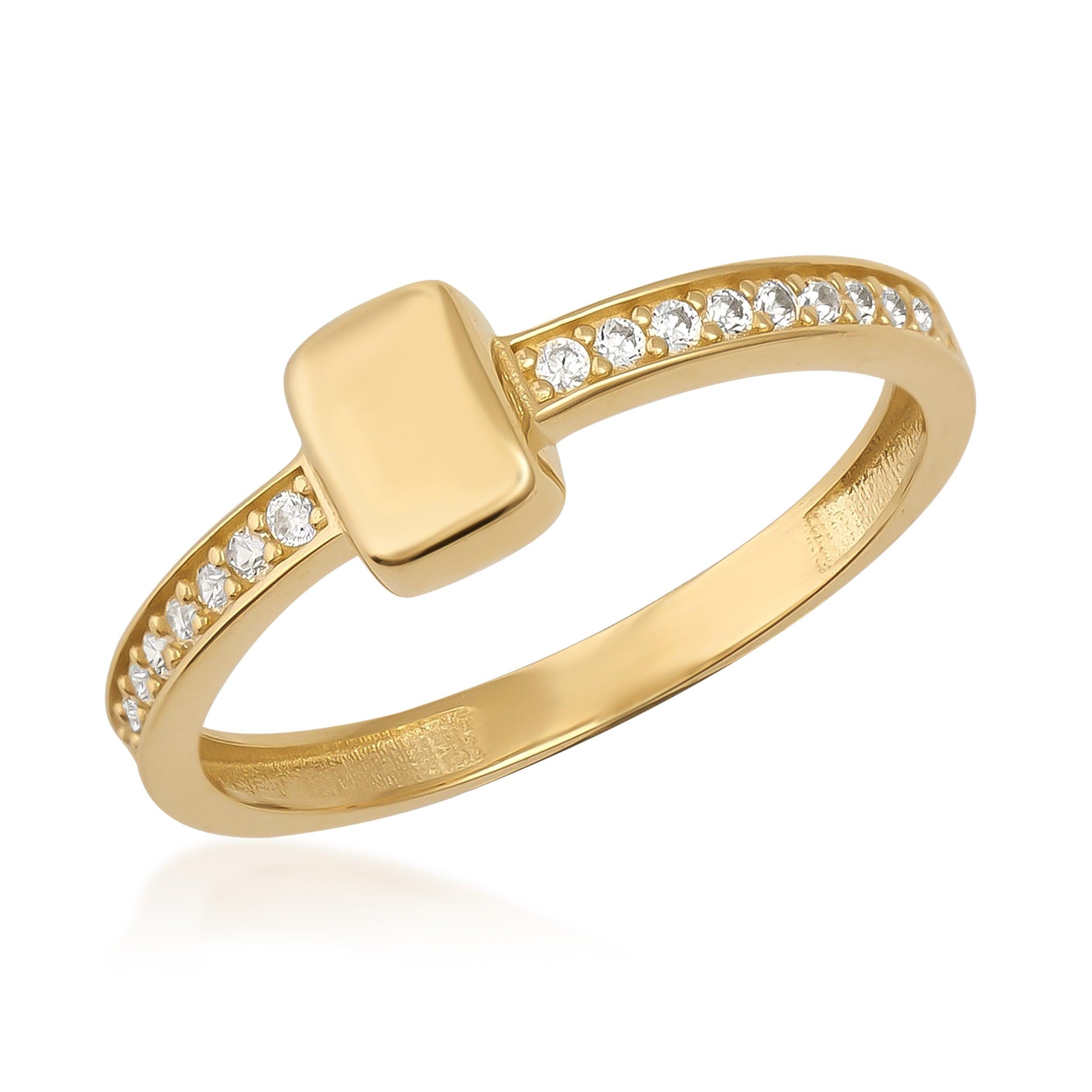 Gold ring with rectangular center and pavé-set clear gemstones on band