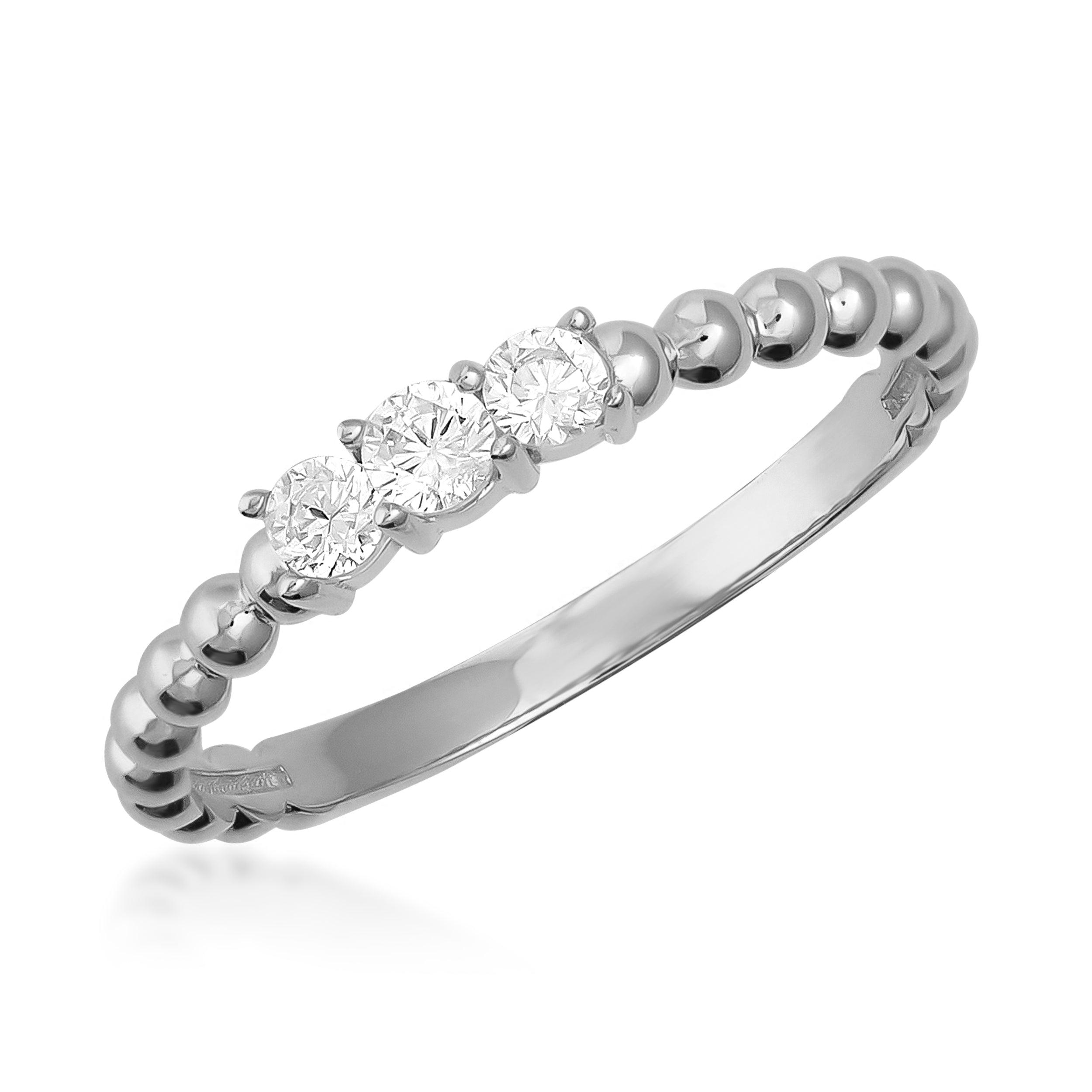 White gold ring with three round diamonds and beaded band, jewelry product photo