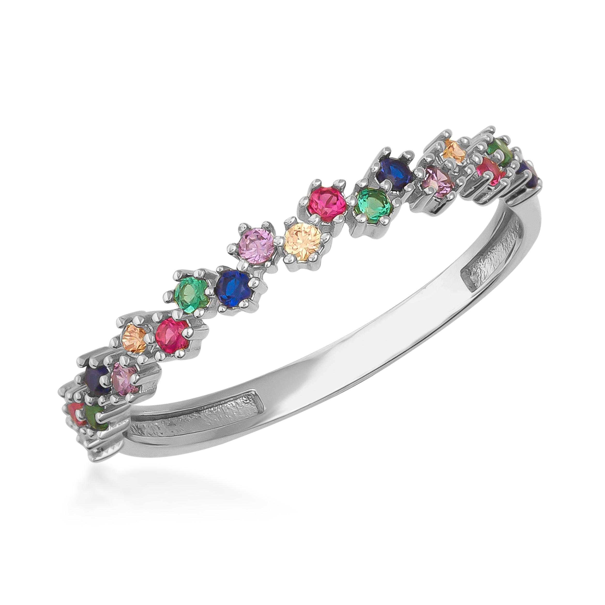 Silver ring with multicolored gemstones arranged in a delicate band, fine jewelry