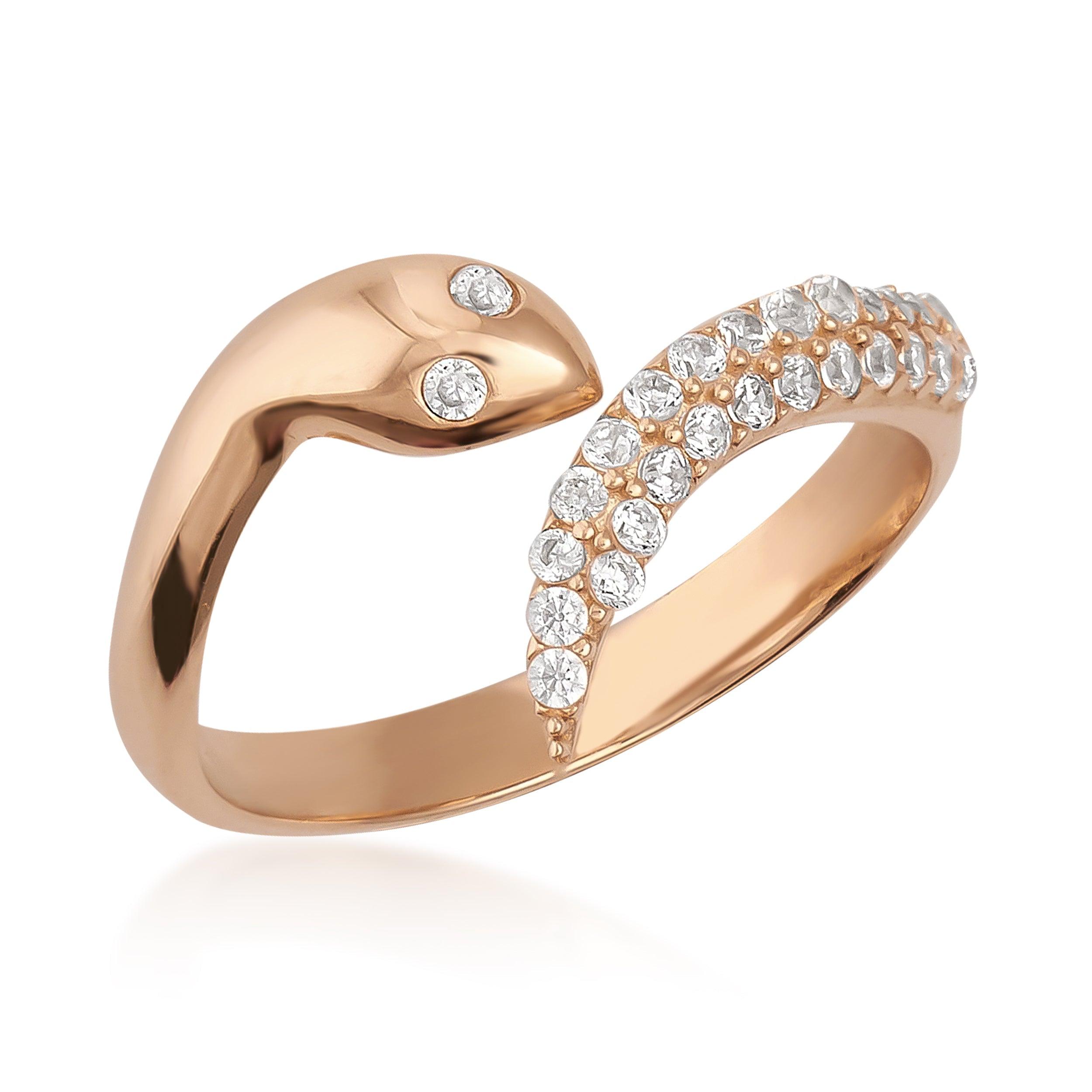 Gold snake-shaped ring with sparkling clear gemstones on a white background.
