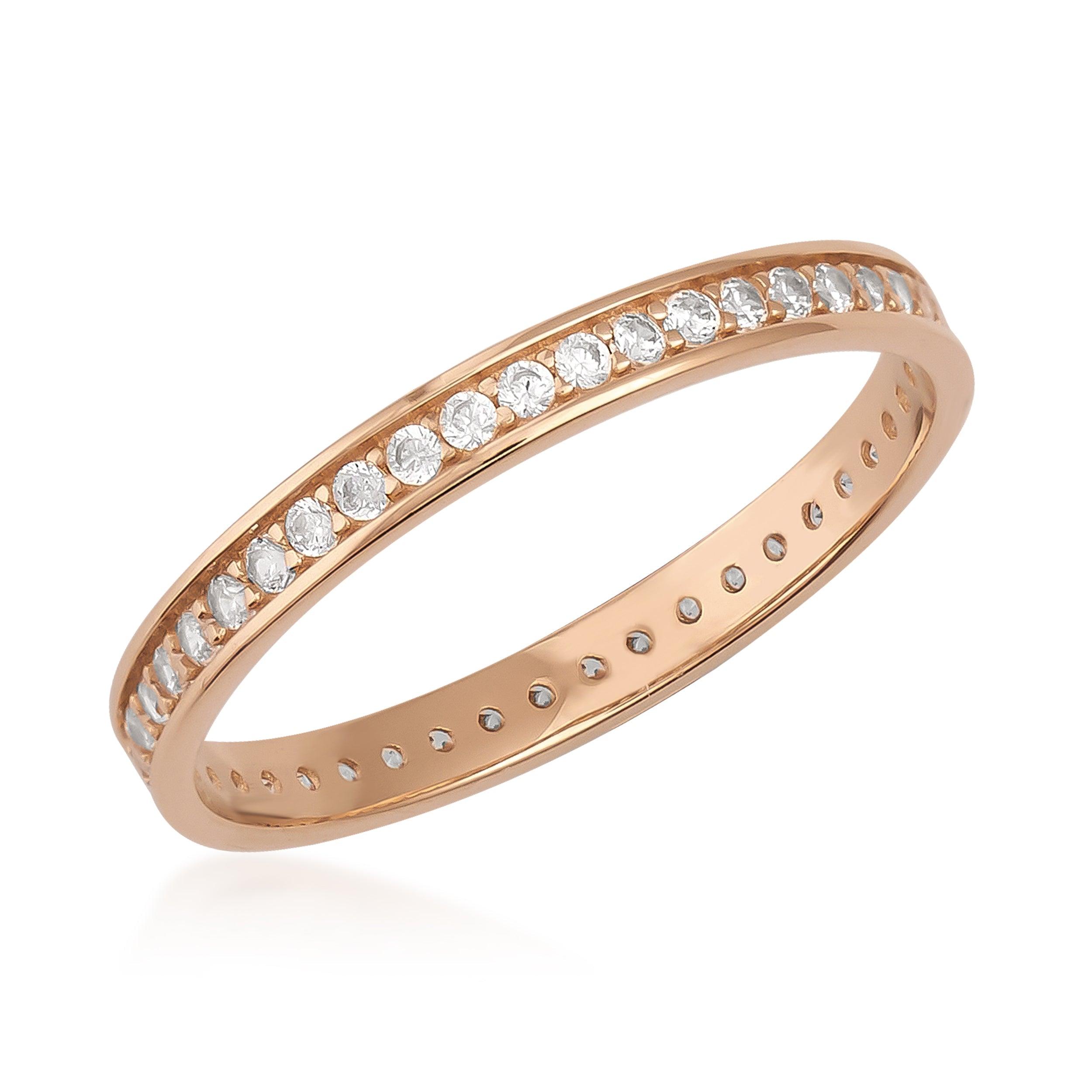 Rose gold diamond eternity band with round-cut stones, elegant and minimalist ring.