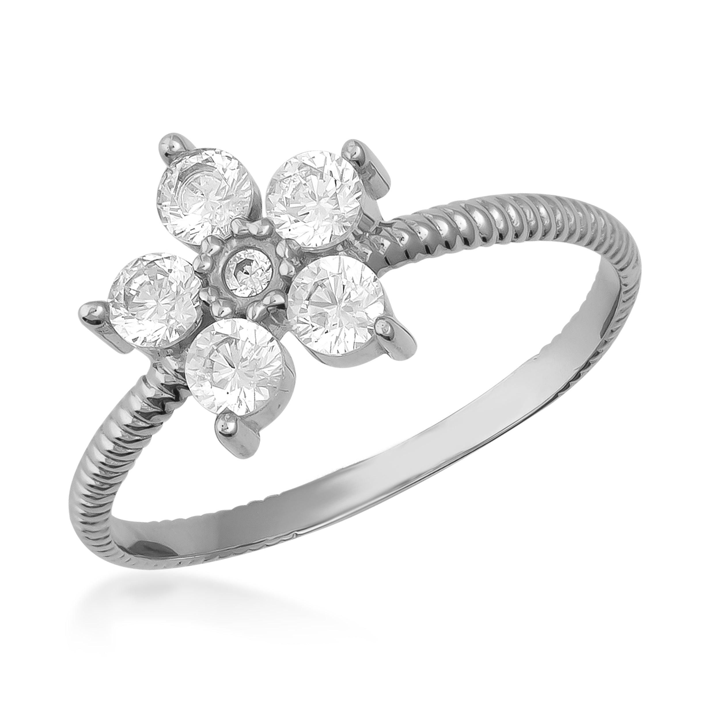 White gold ring with six round diamonds in a floral cluster setting, textured band