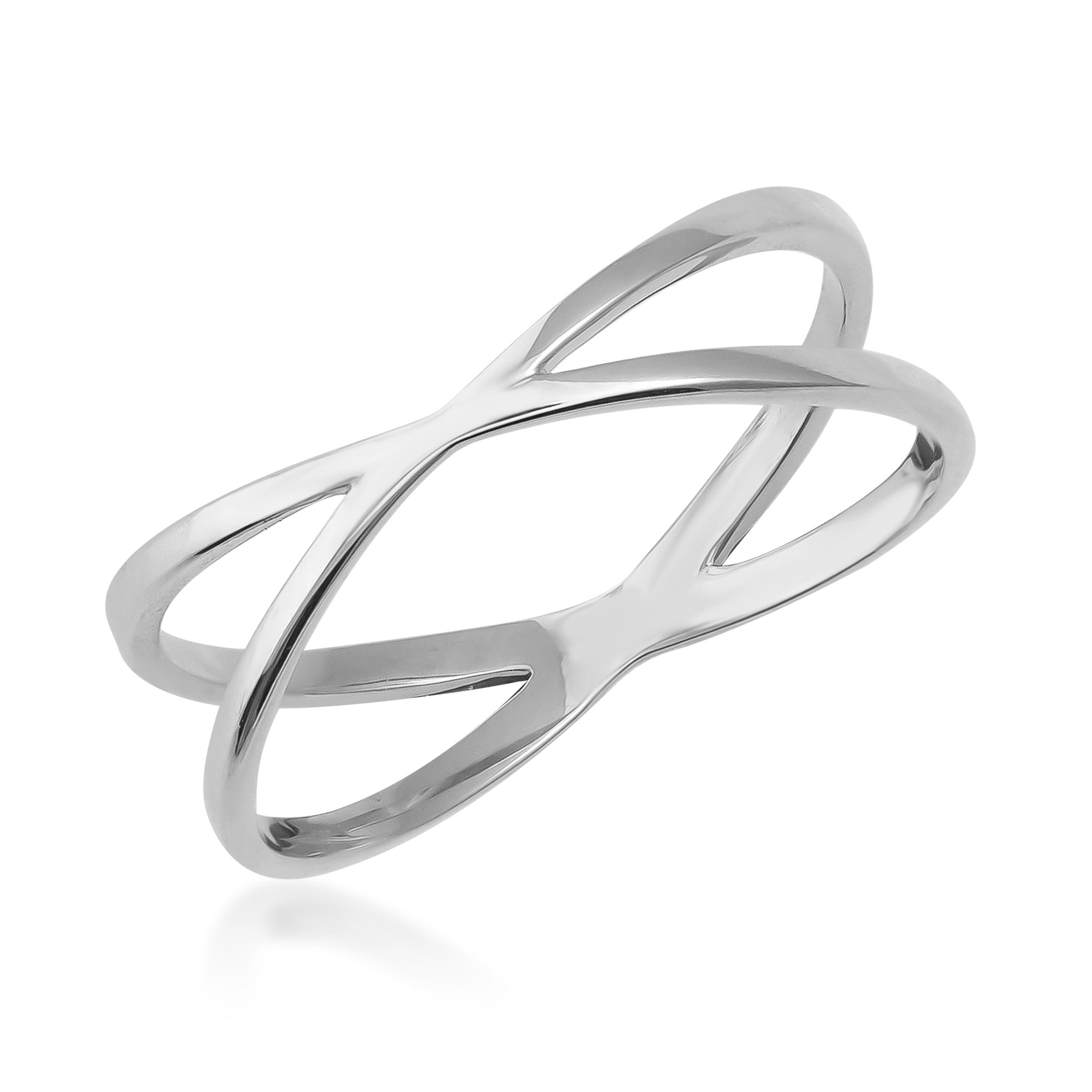 Minimalist open crossover silver ring with polished finish on white background