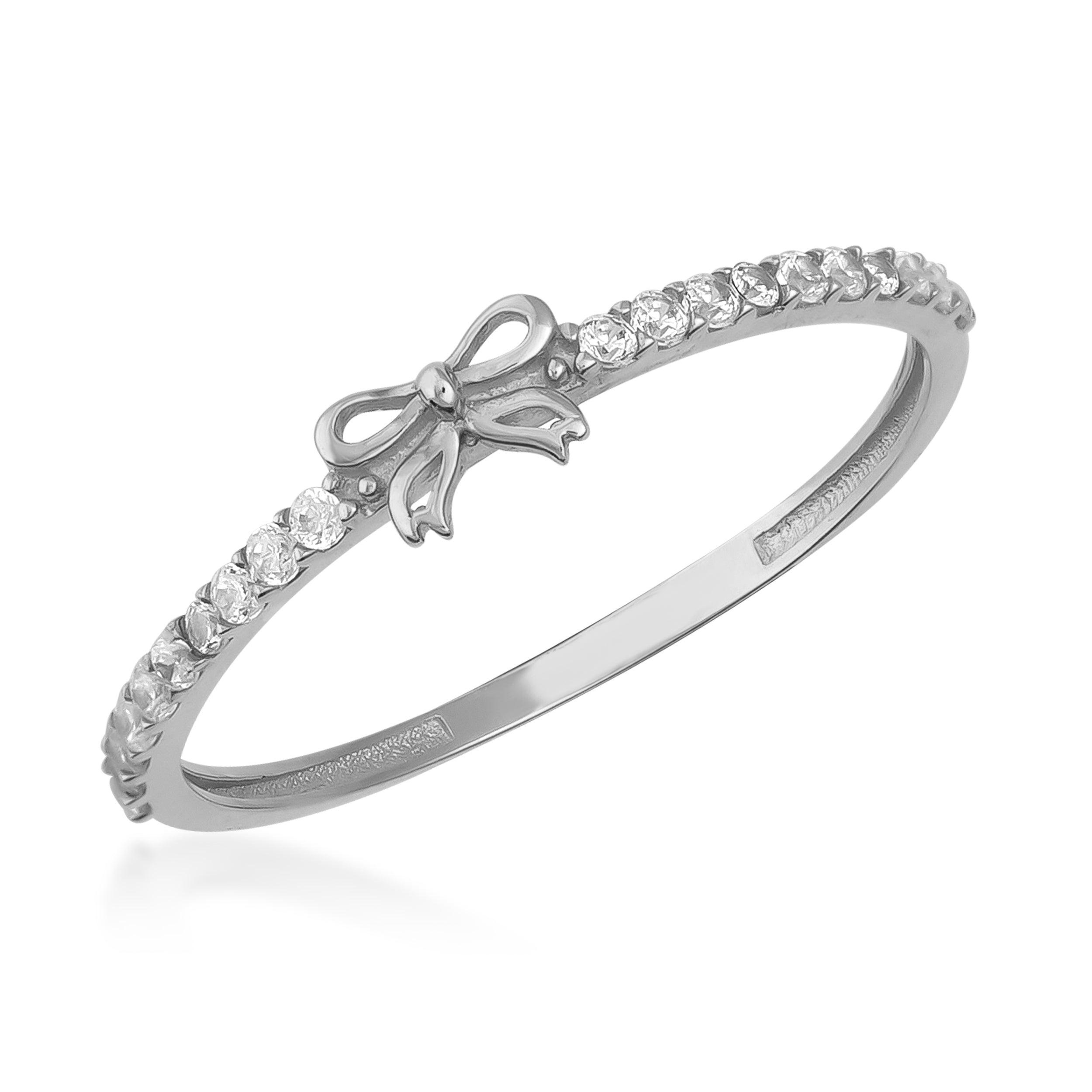 Elegant white gold ring with bow design and row of sparkling round-cut gemstones
