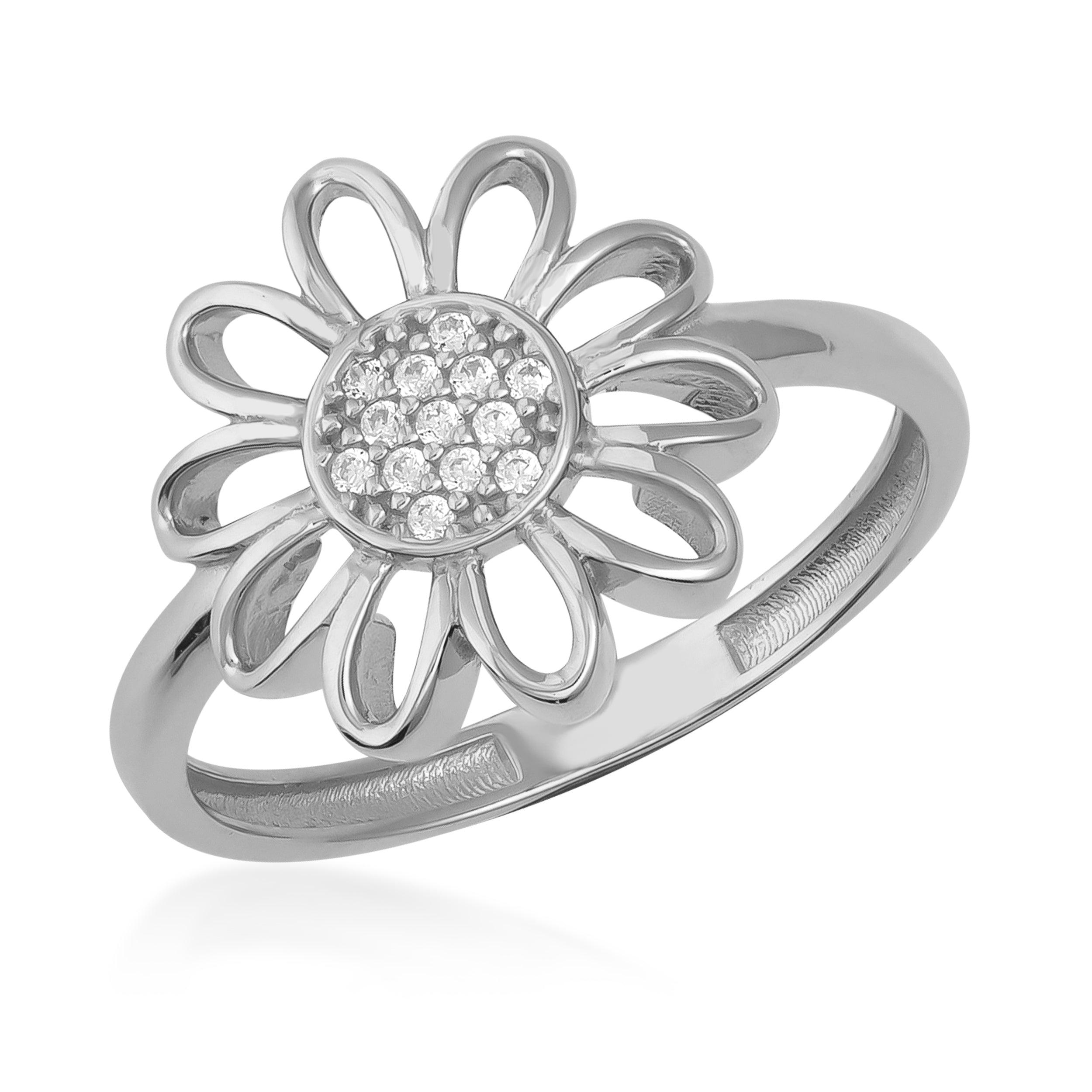 Gold flower ring with open petals and diamond accents on white background