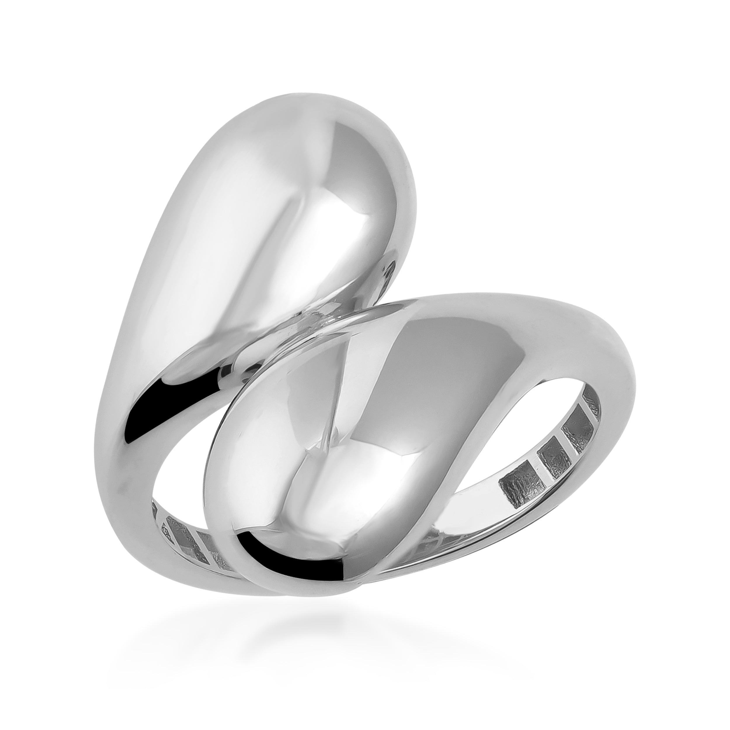 Modern wide band polished silver ring with abstract design on white background