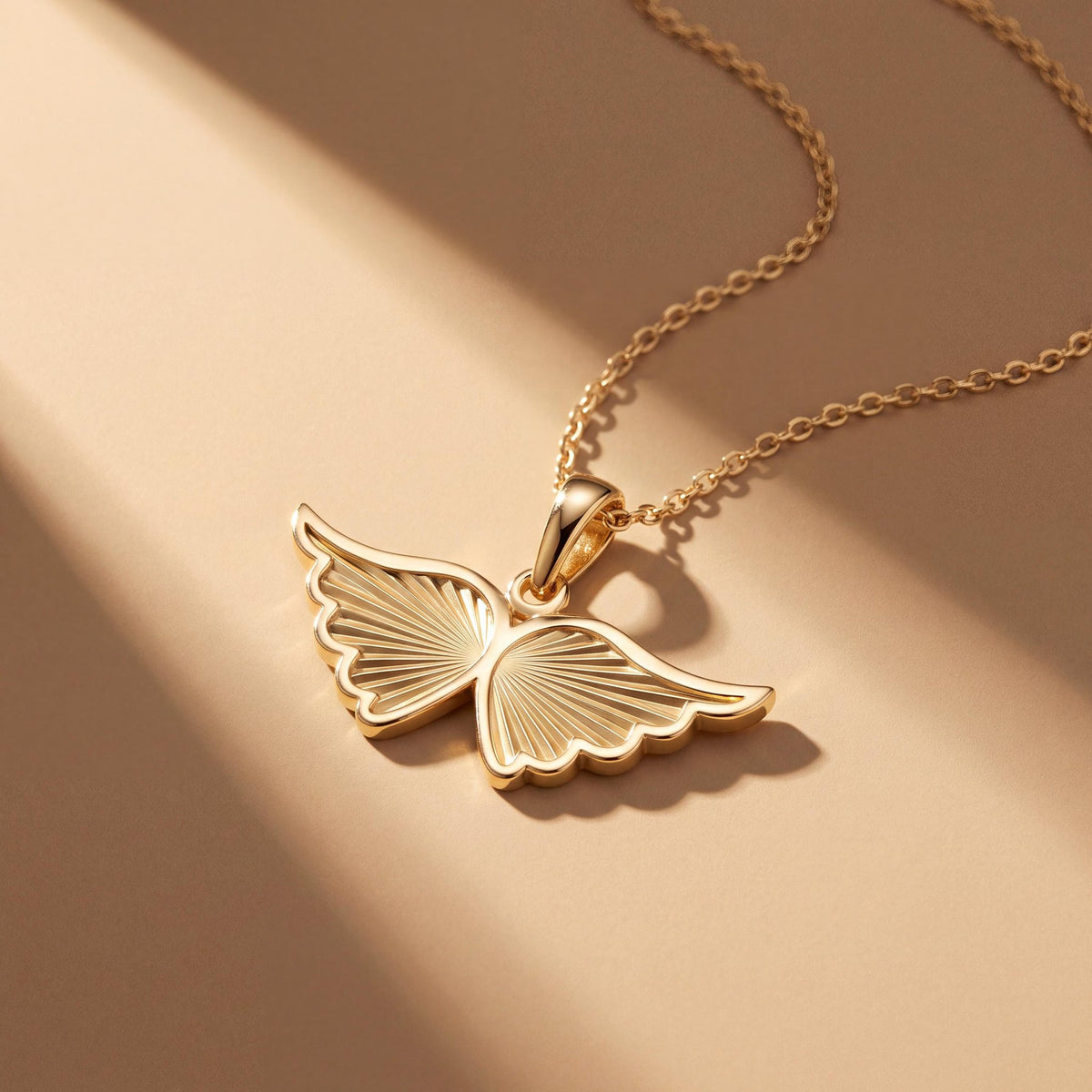 14K gold angel wing necklace, styled view