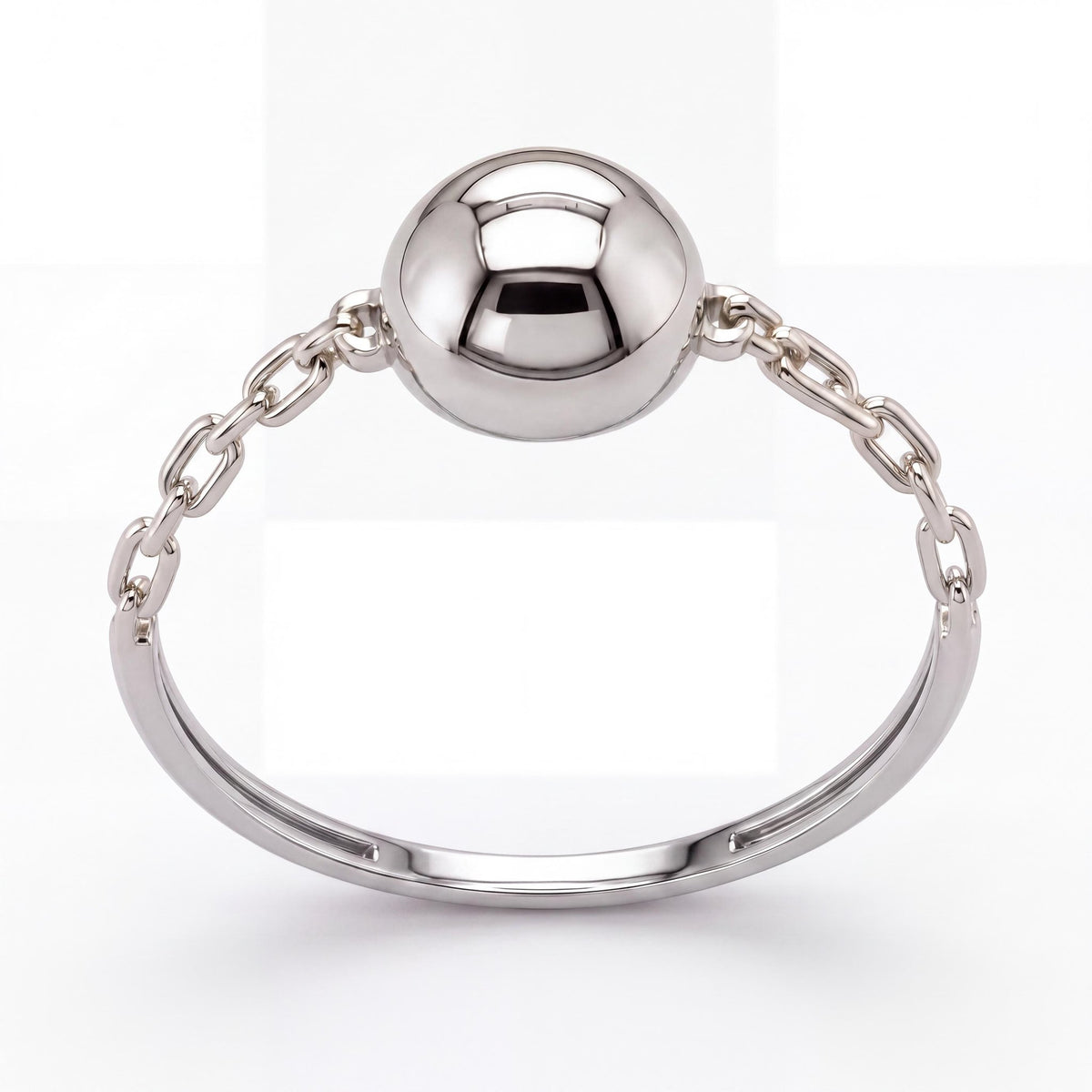 14K white gold ball ring, polished sphere held by chain links on a slim band, front view