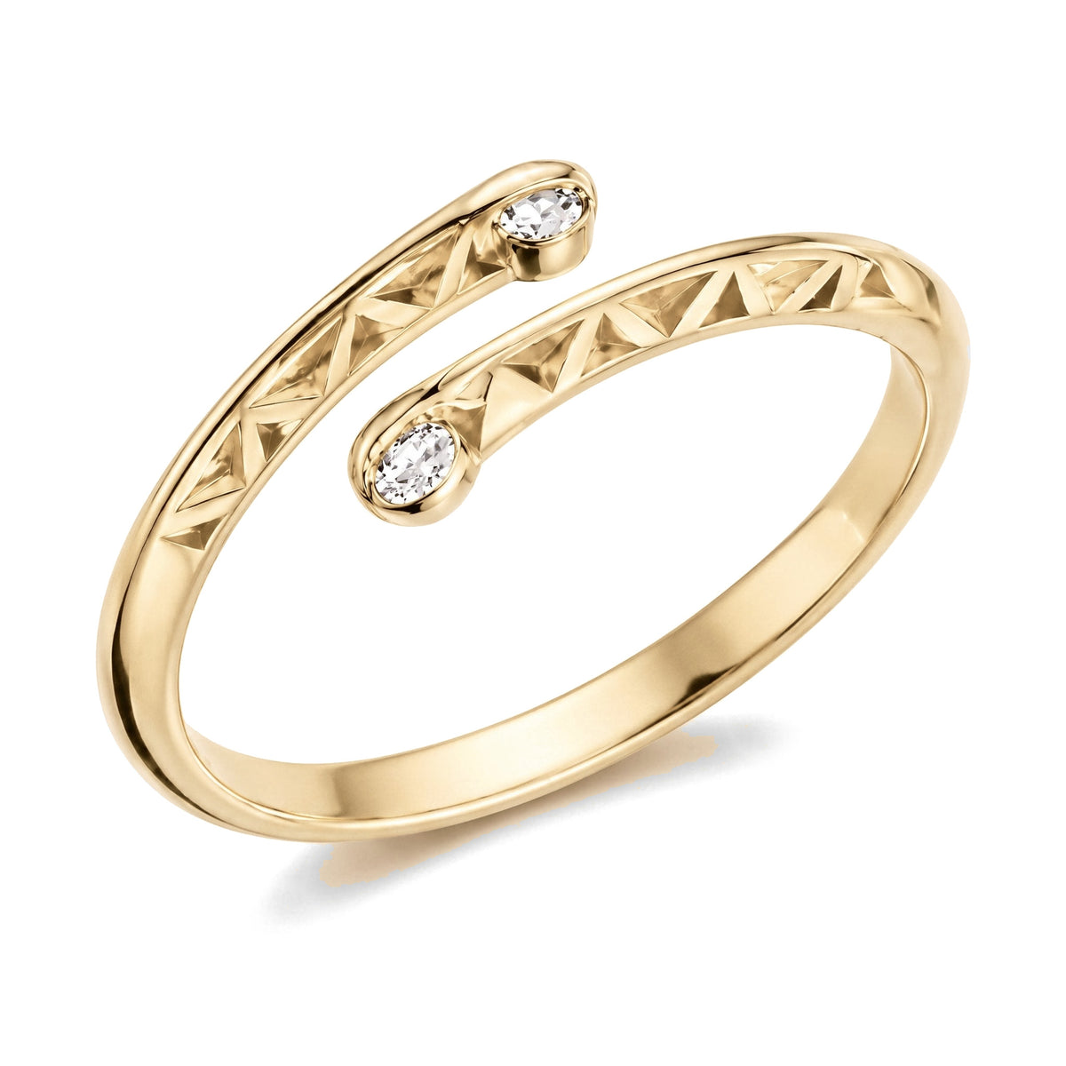 14K yellow gold bypass ring, open band with triangle cut-outs and a clear stone at each tip, on white
