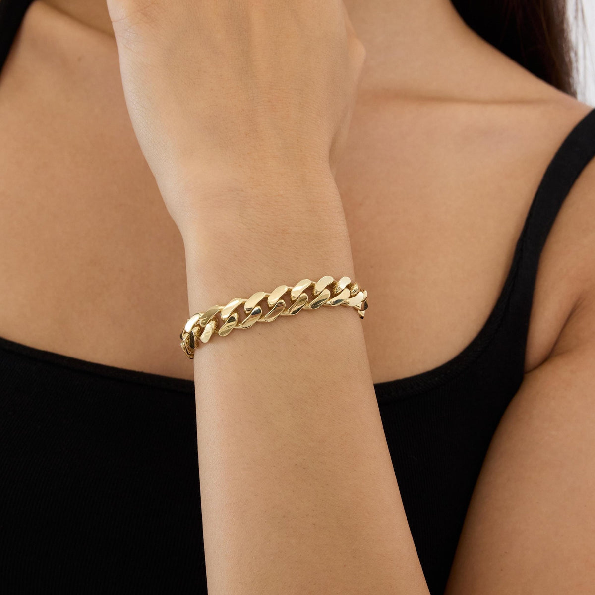 14K gold cuban link bracelet chain necklace, styled view