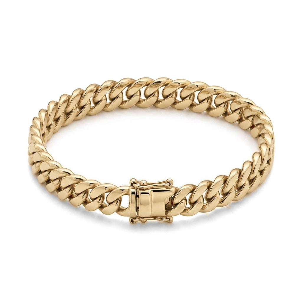 14K yellow gold Cuban link bracelet, thick curb links closed with a box clasp, on white