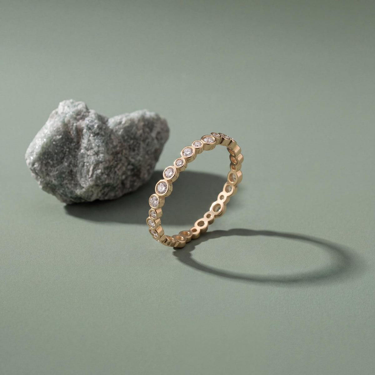 14K gold cz bezel eternity band ring, styled view