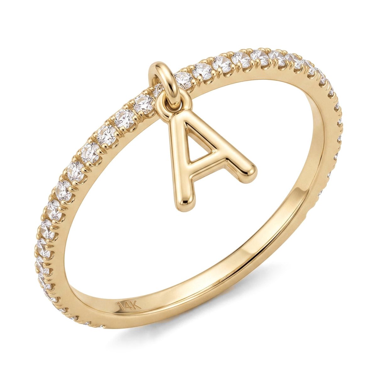 14K yellow gold dangle initial ring, thin clear stone pavé band with a hanging letter A charm, on white