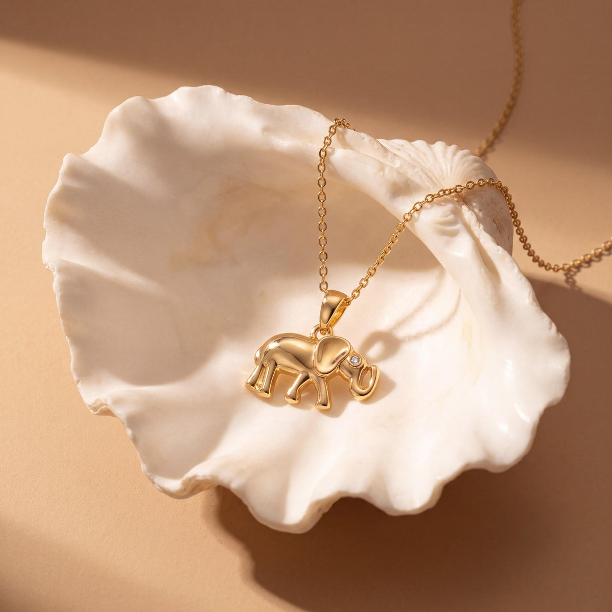 14K gold elephant necklace, styled view