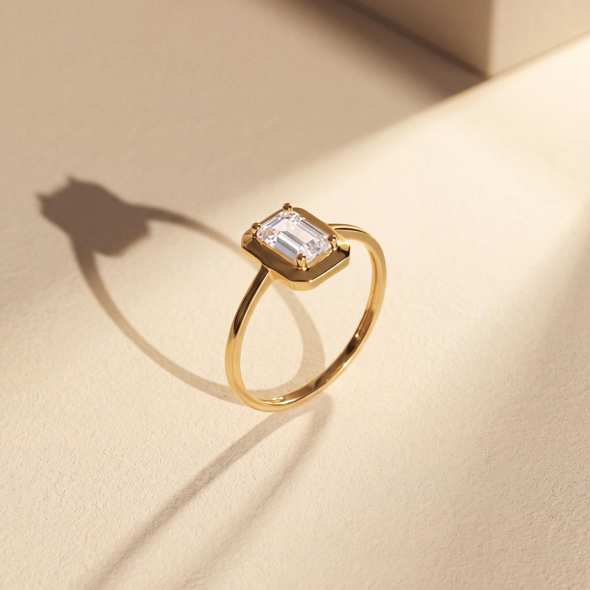 14K gold emerald-cut cz solitaire ring, styled view