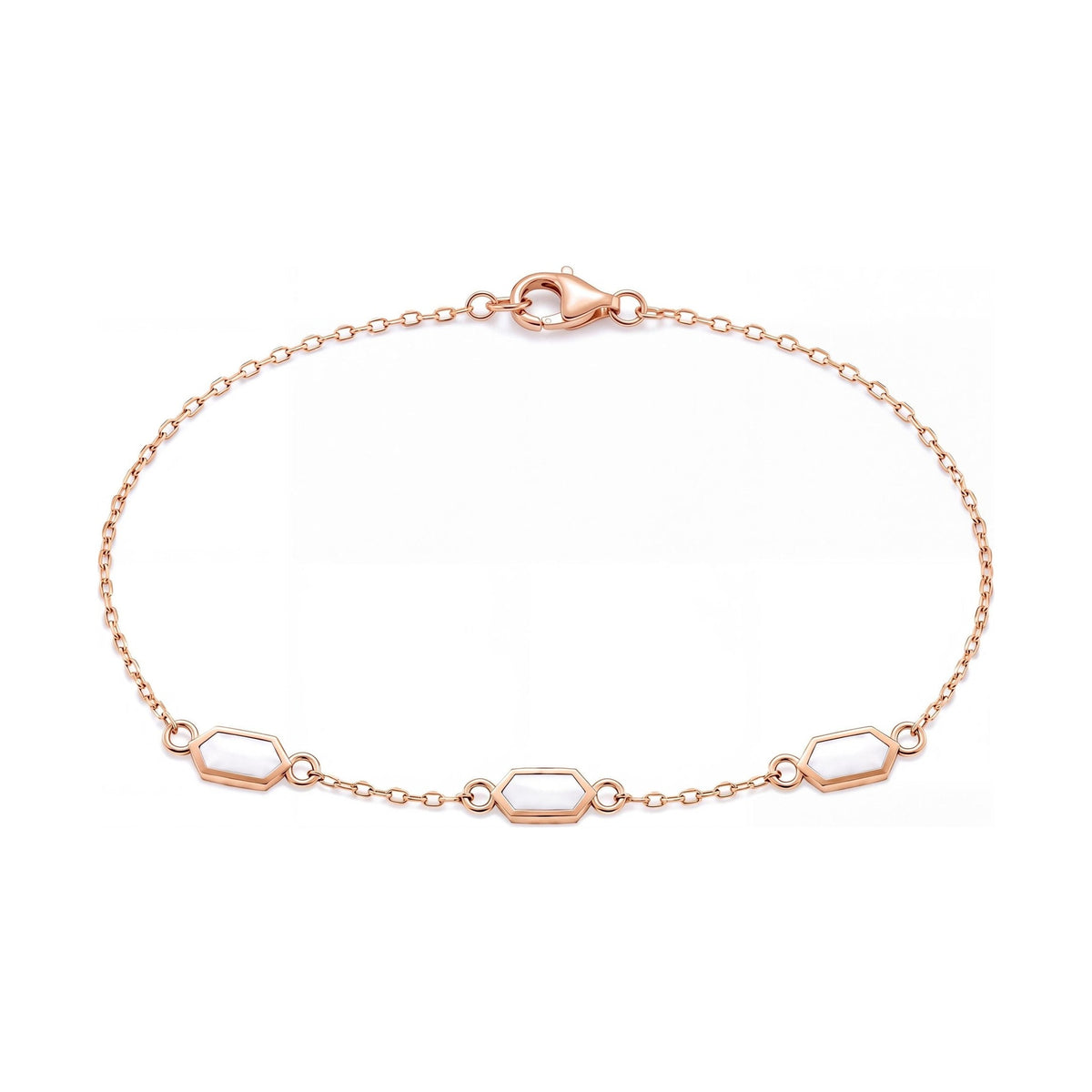 14K rose gold enamel bracelet, three white enamel hexagon stations on a fine cable chain, on white